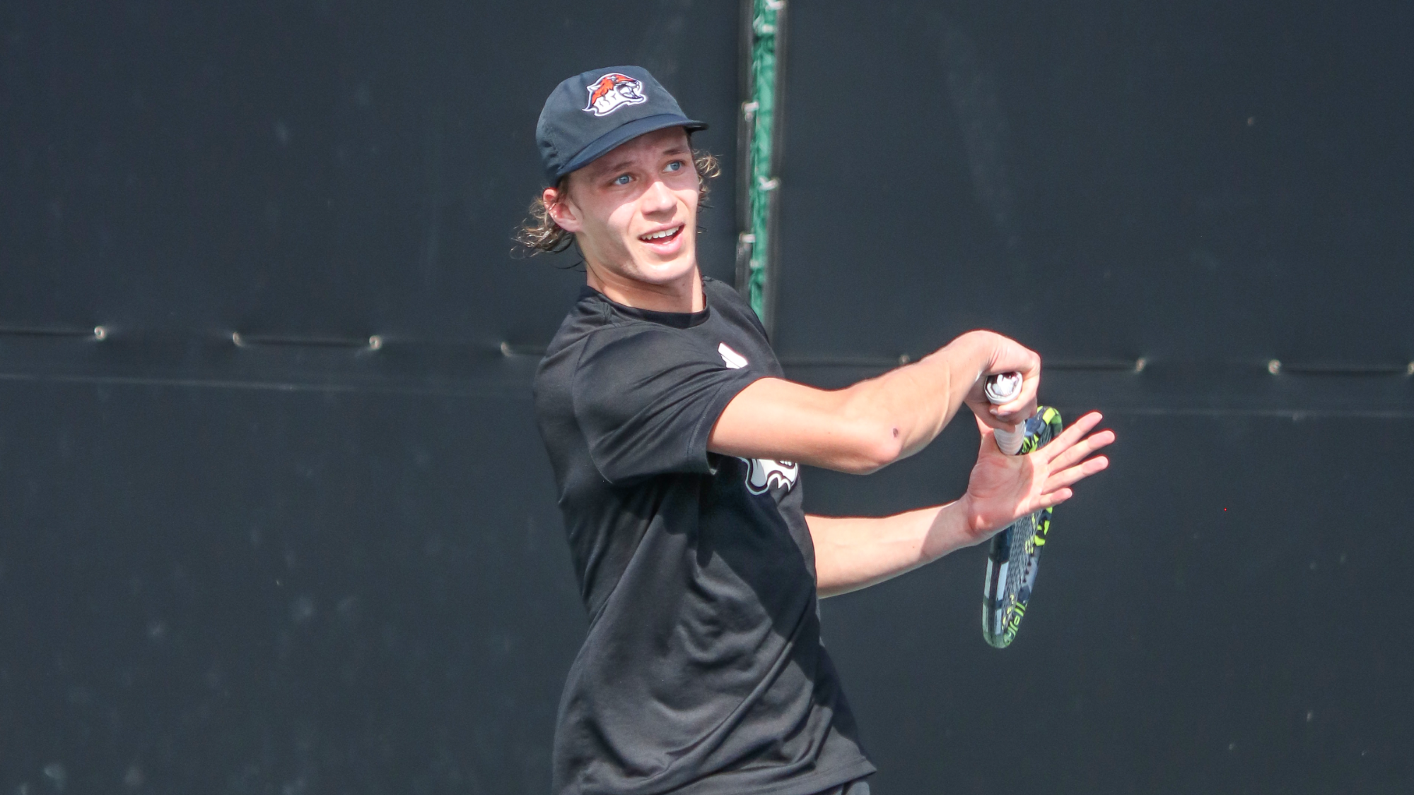 Tate Ransom hits a forehand