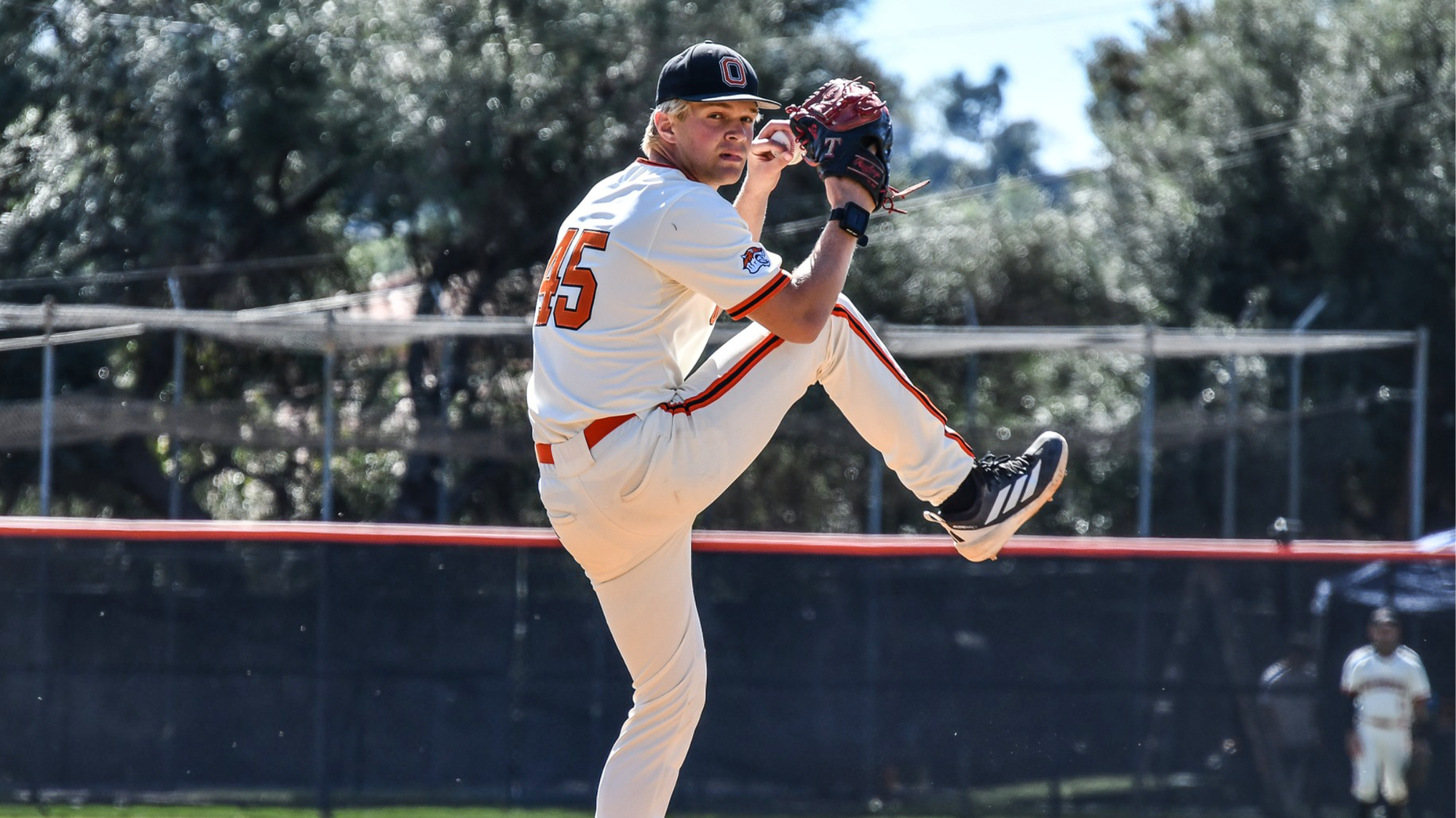 Riley Holcomb about to pitch the ball