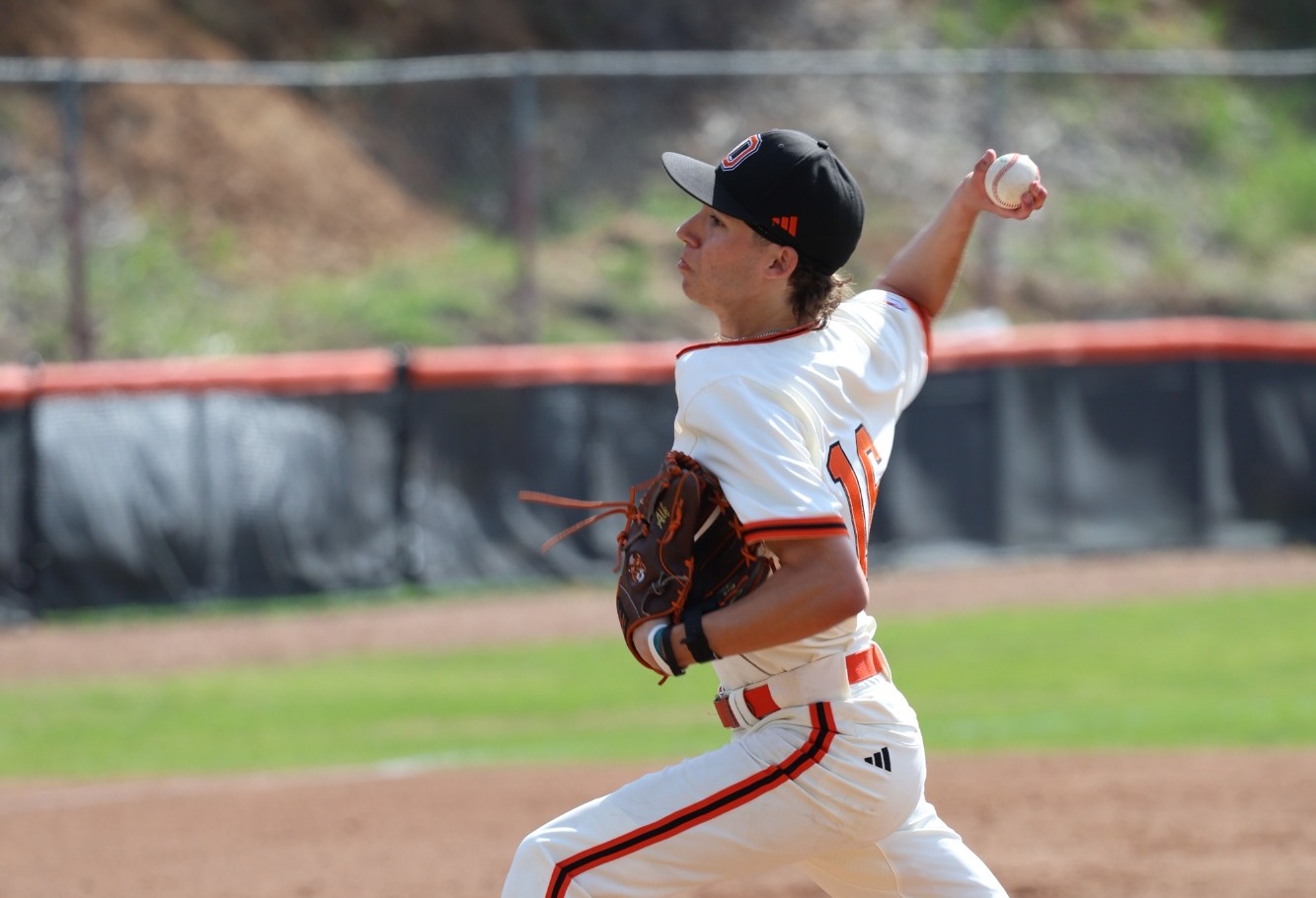 Aidan Alfers throws a pitch