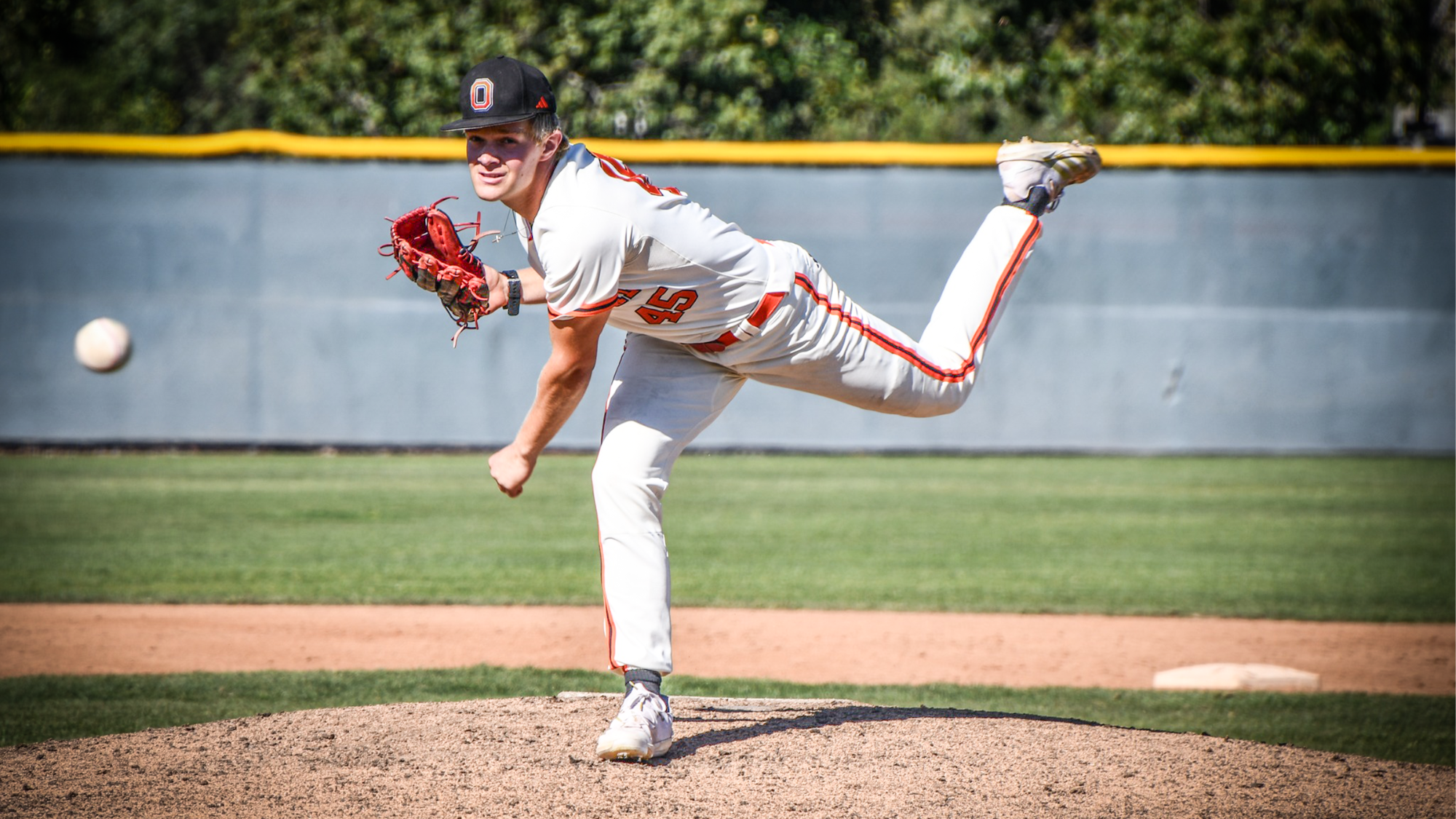 Riley Holcomb throws a pitch