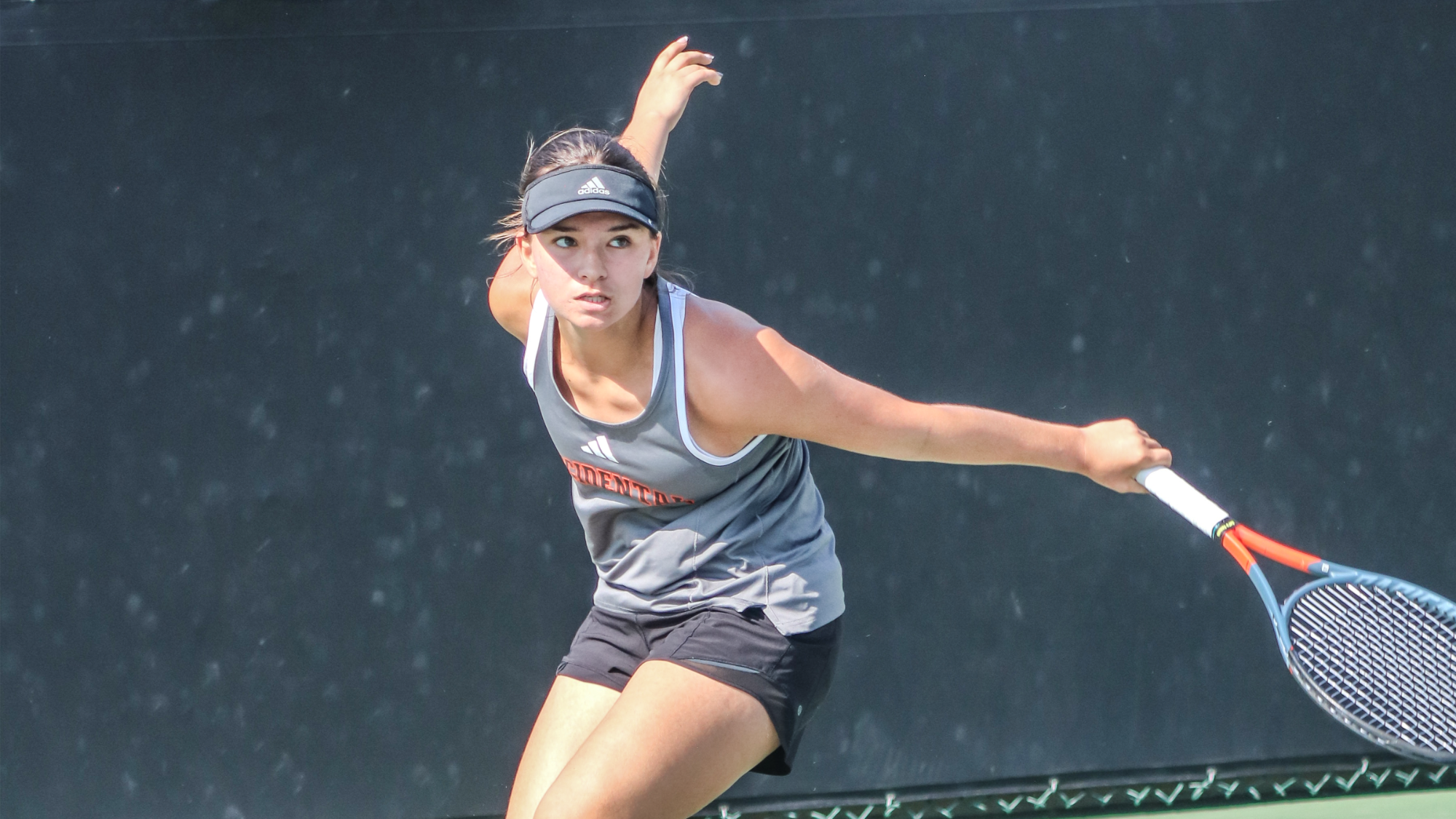 Elise Jay hits a backhanded slice