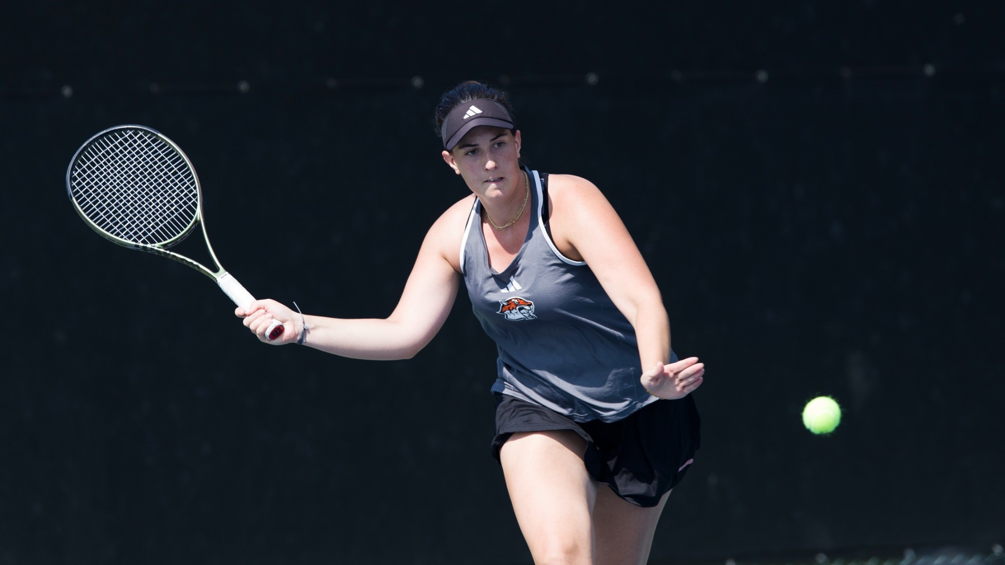 Greta Nagy hits a forehanded drop shot