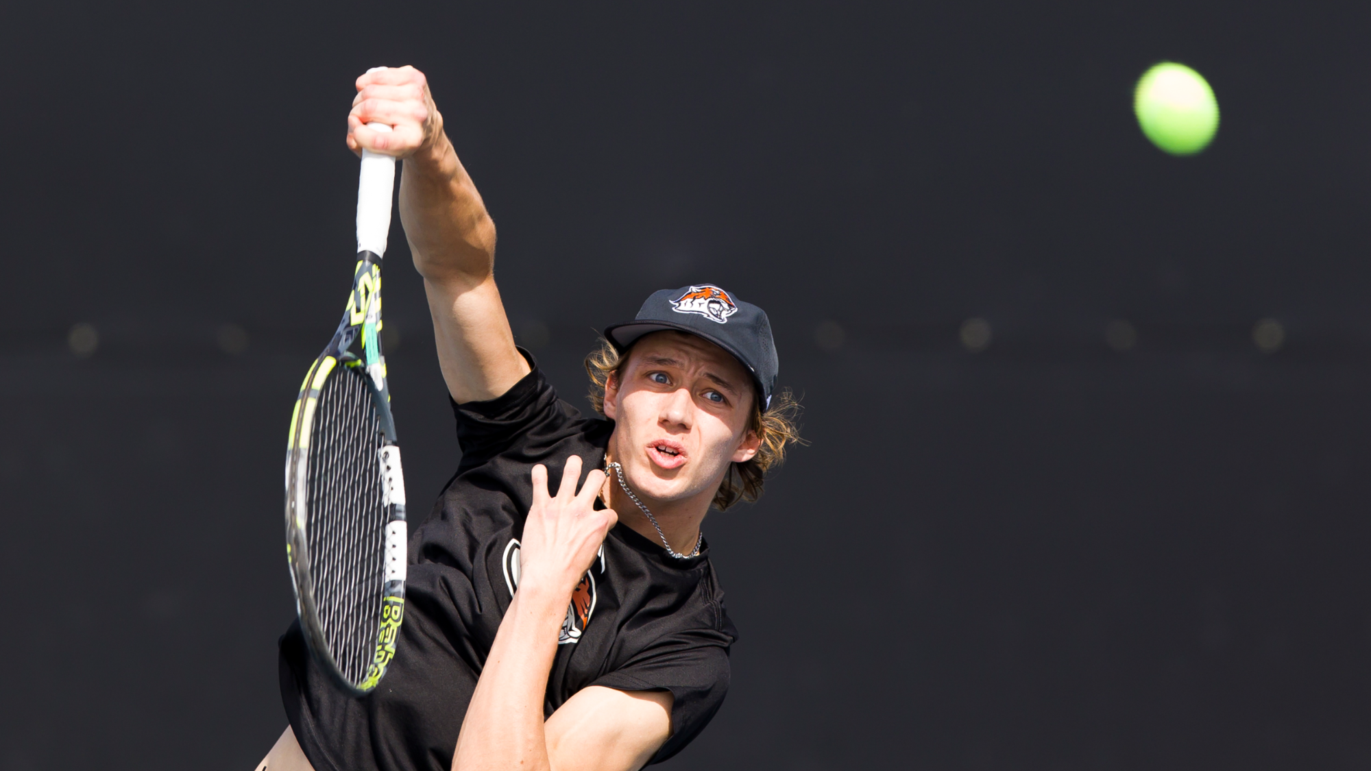 Tate Ransom hits a serve