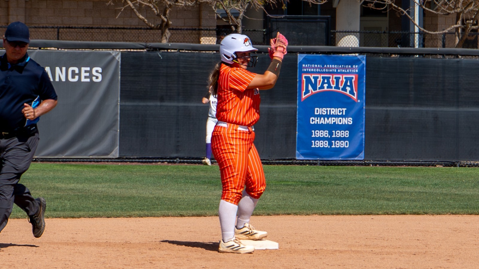 Rachel Rotunno on second base clapping