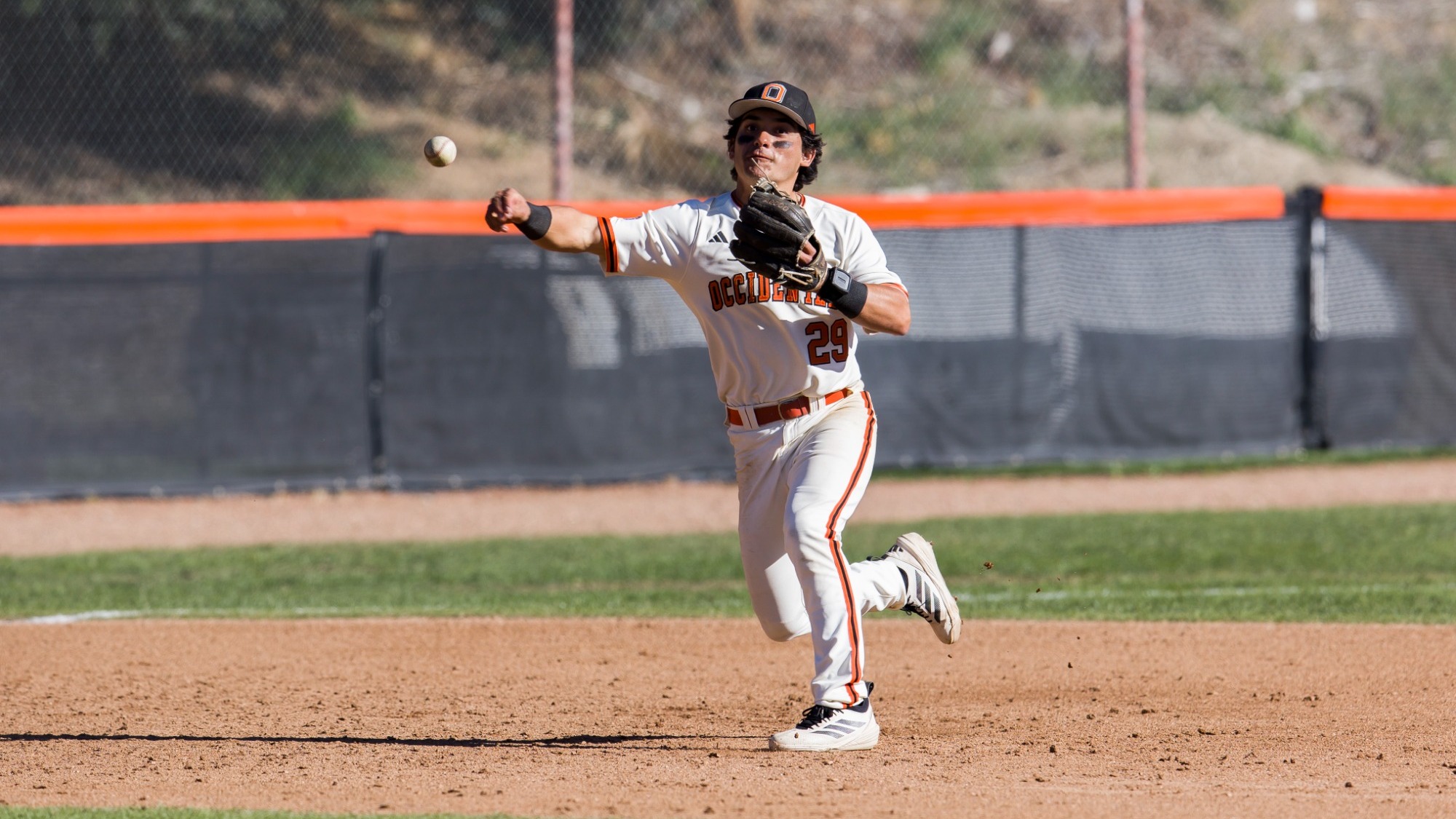 nick gonzalez throws the ball from third