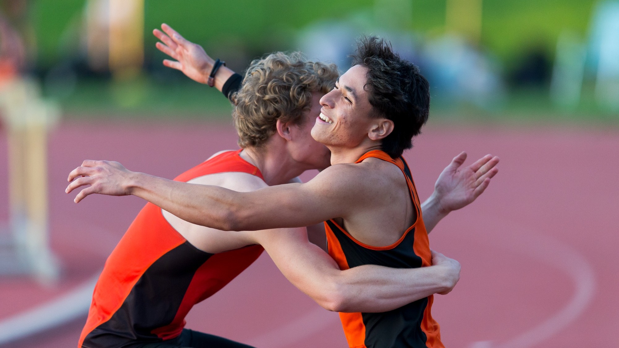 James Buellesbach and Shane Kawakami-Williams hugging