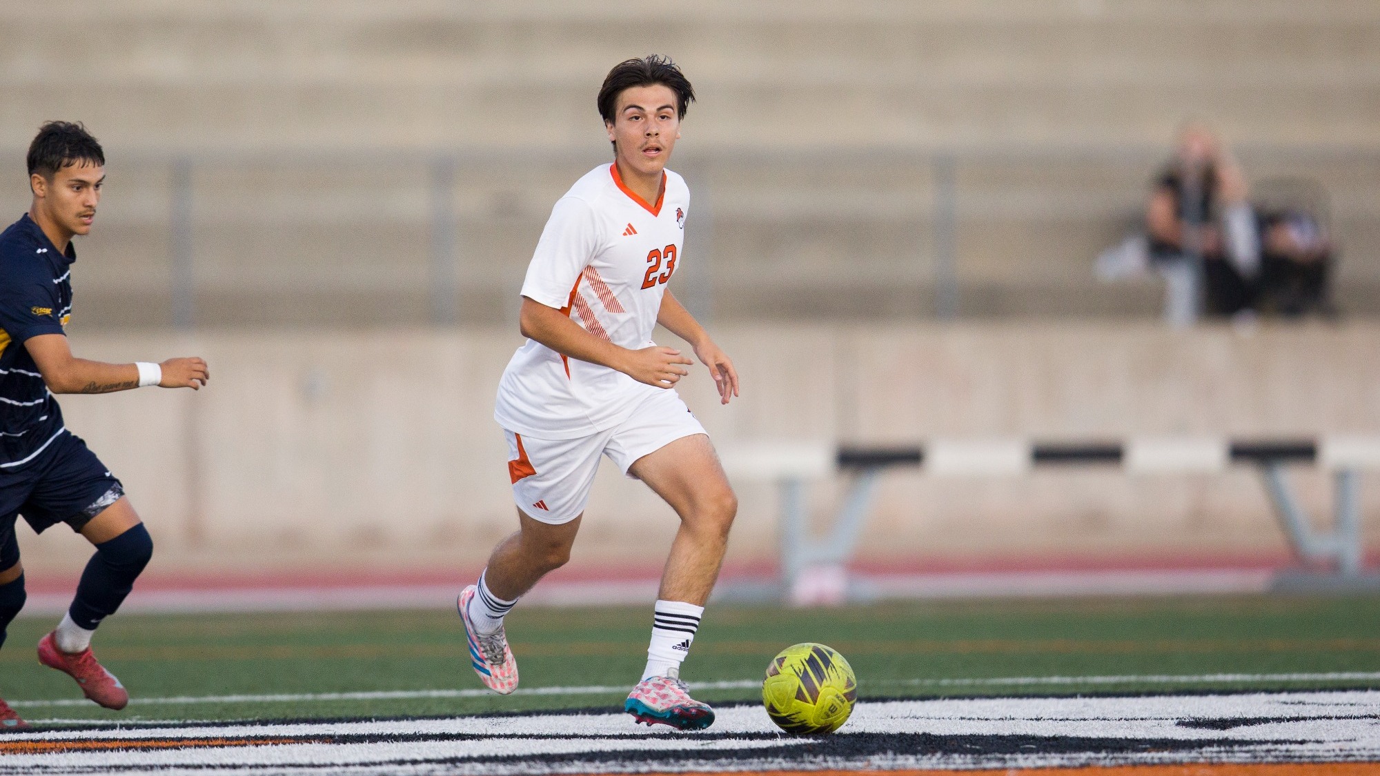 Kent Ortiz looks to make a pass