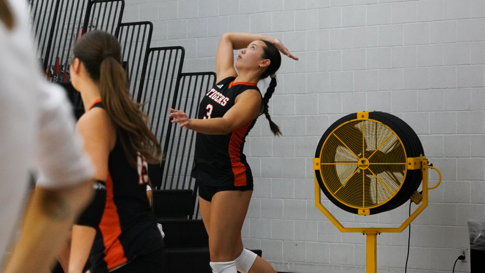 Chloe Jeong serves