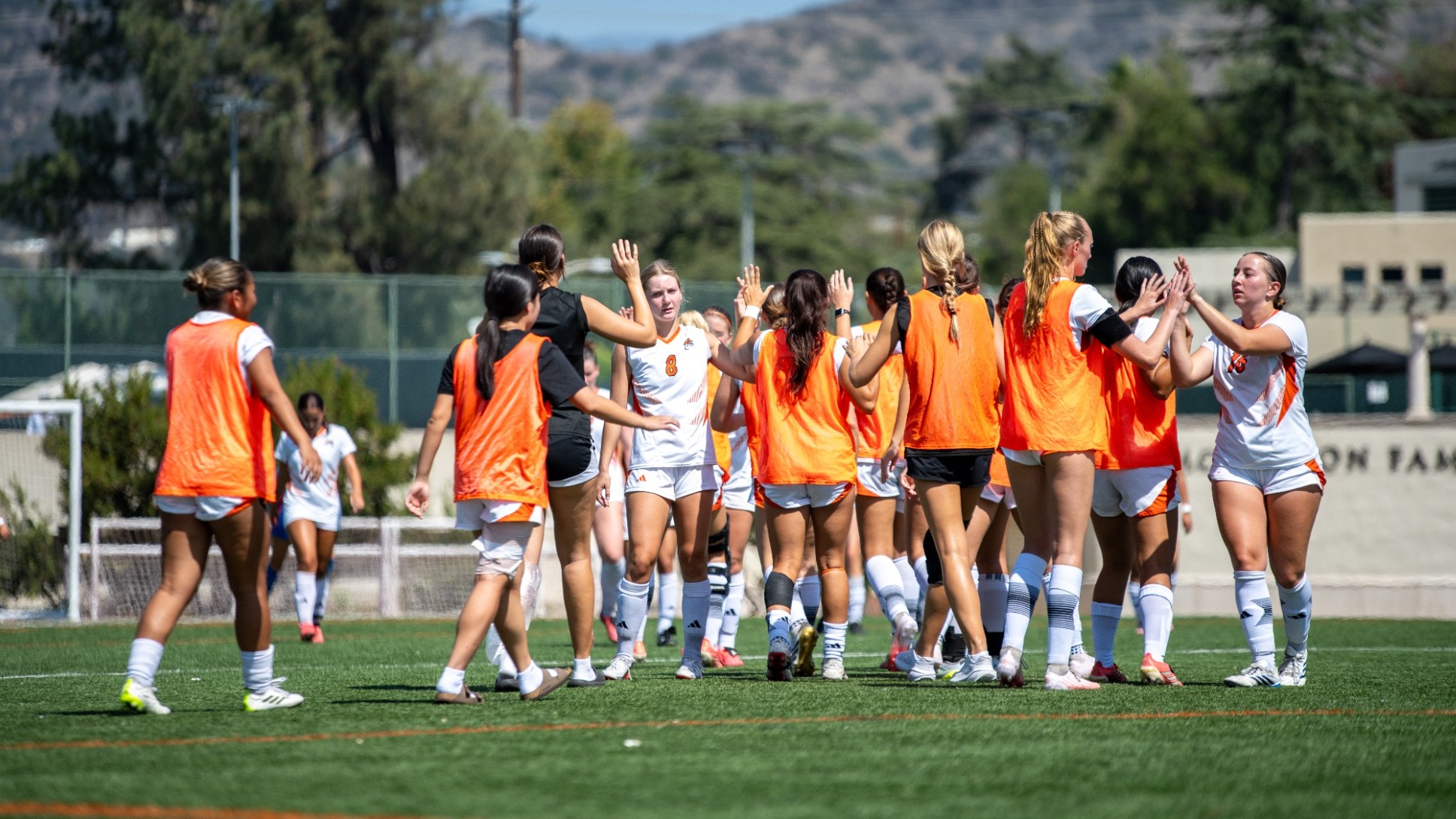 Oxy women's soccer celebration after goal