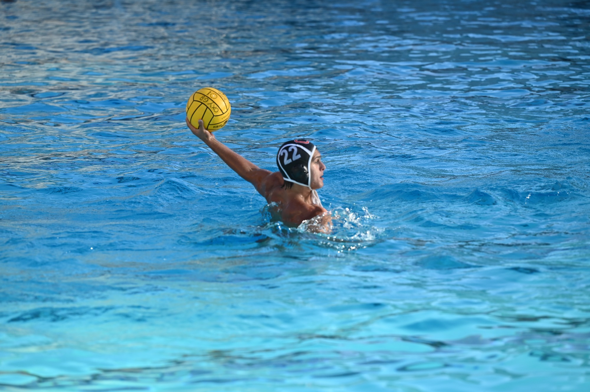 #22 lines up a shot at goal