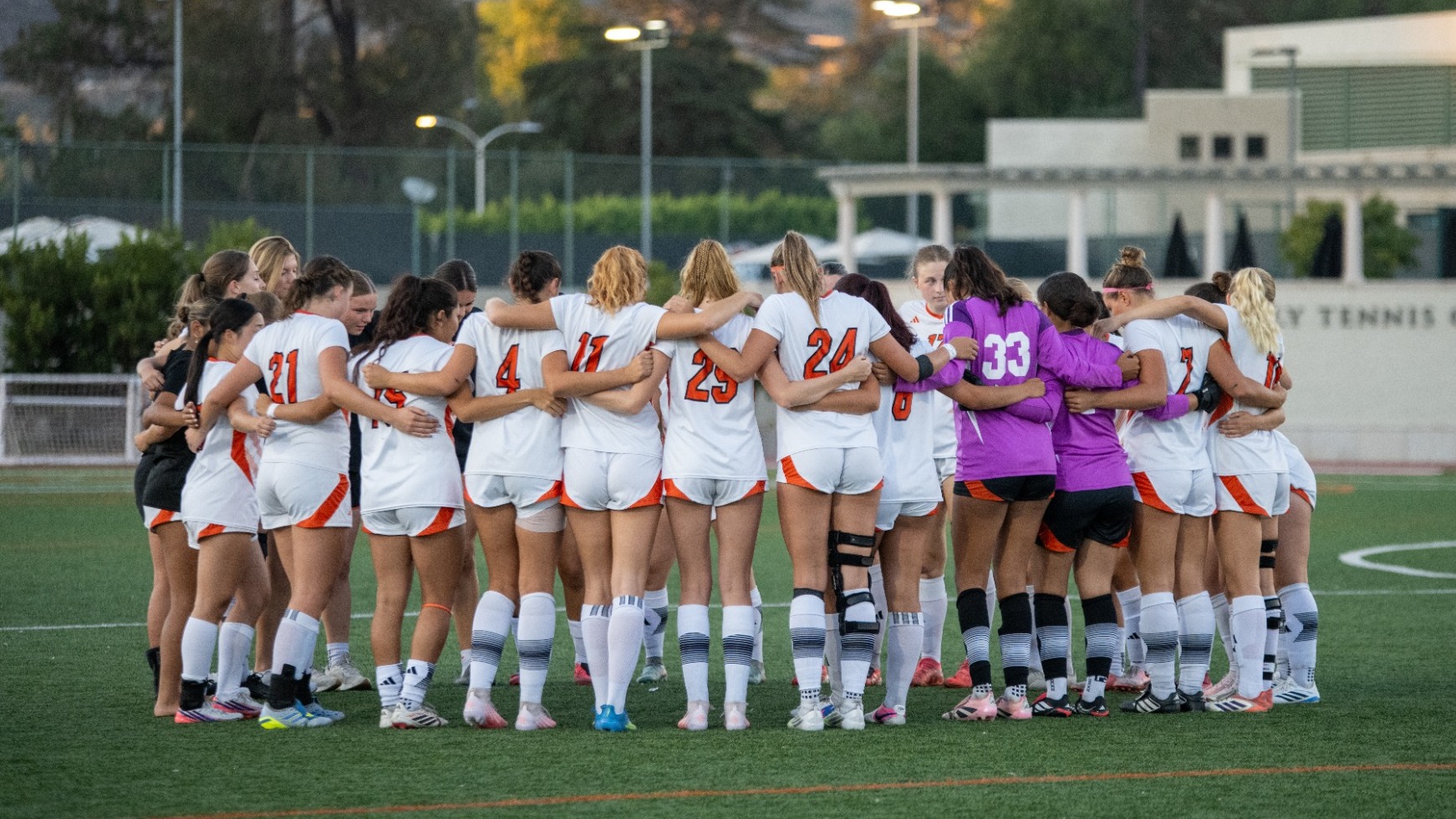 Occidental women's soccer huddled before kickoff