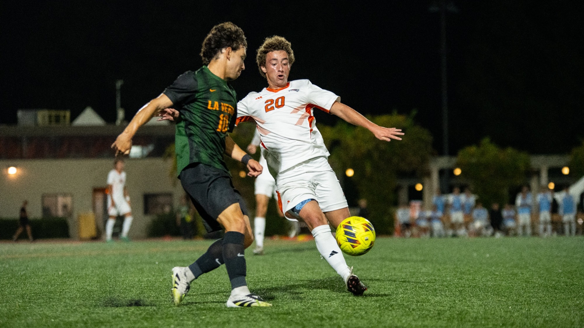 Enzo Bernales fights for the ball