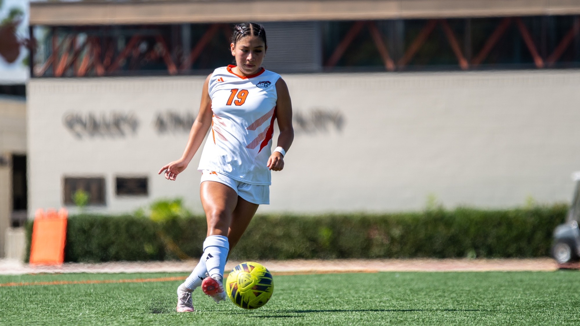 Diana Reyes-Sanchez kicks the ball