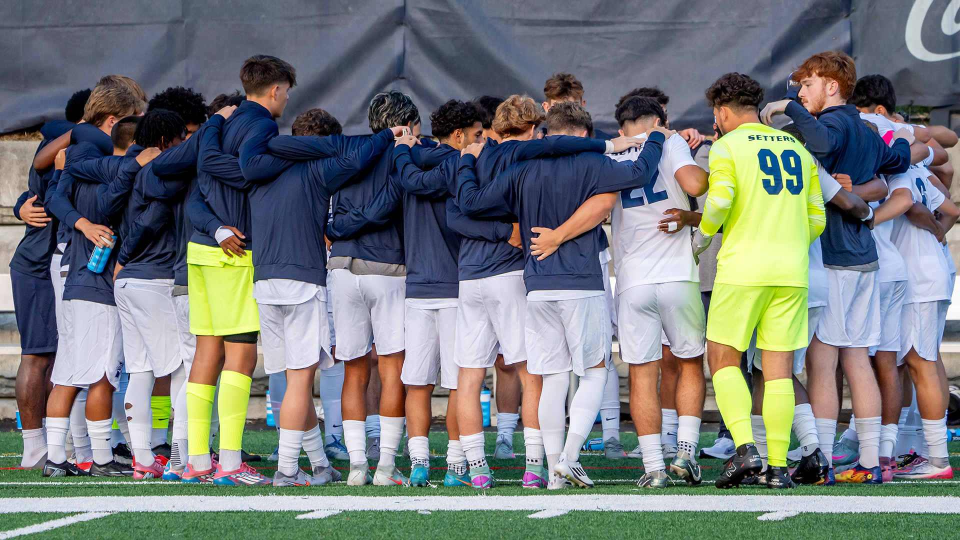 Men's Soccer 2025 Team Huddle Action Shot