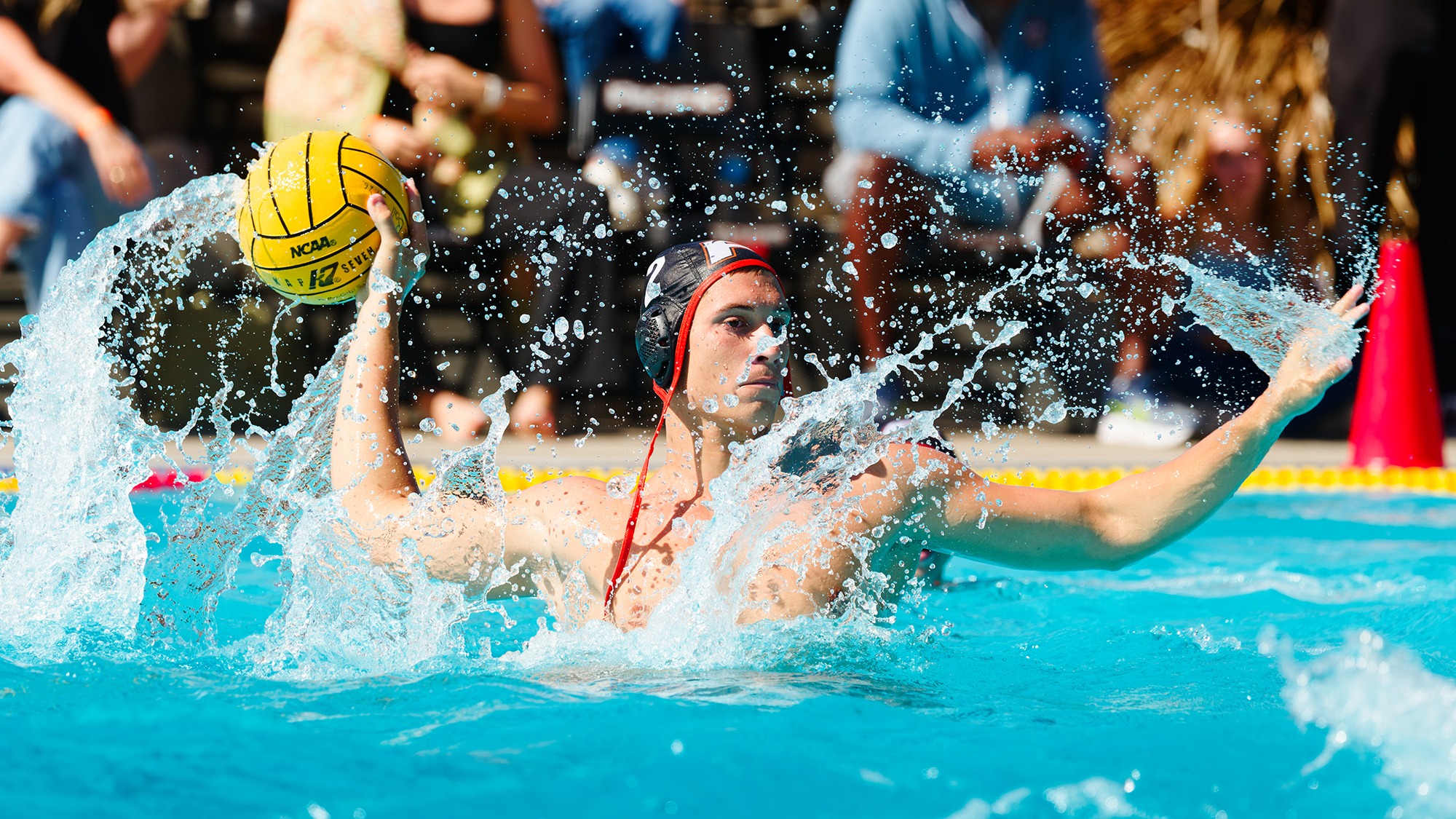Kalman Tomozi passing the ball vs. LMU 2026