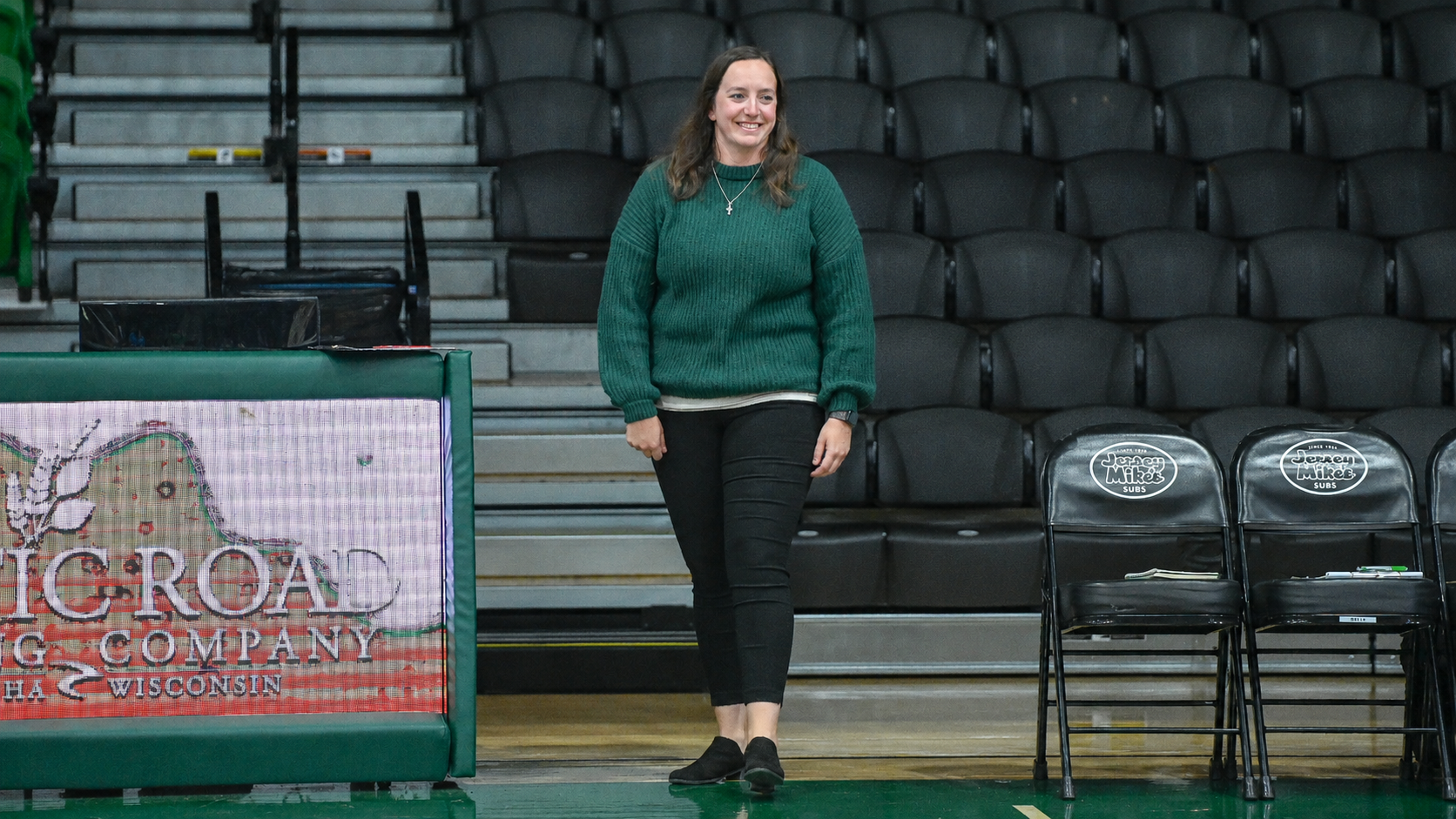 Leigh Barea Walking on DeSimone Arena Floor Smiling
