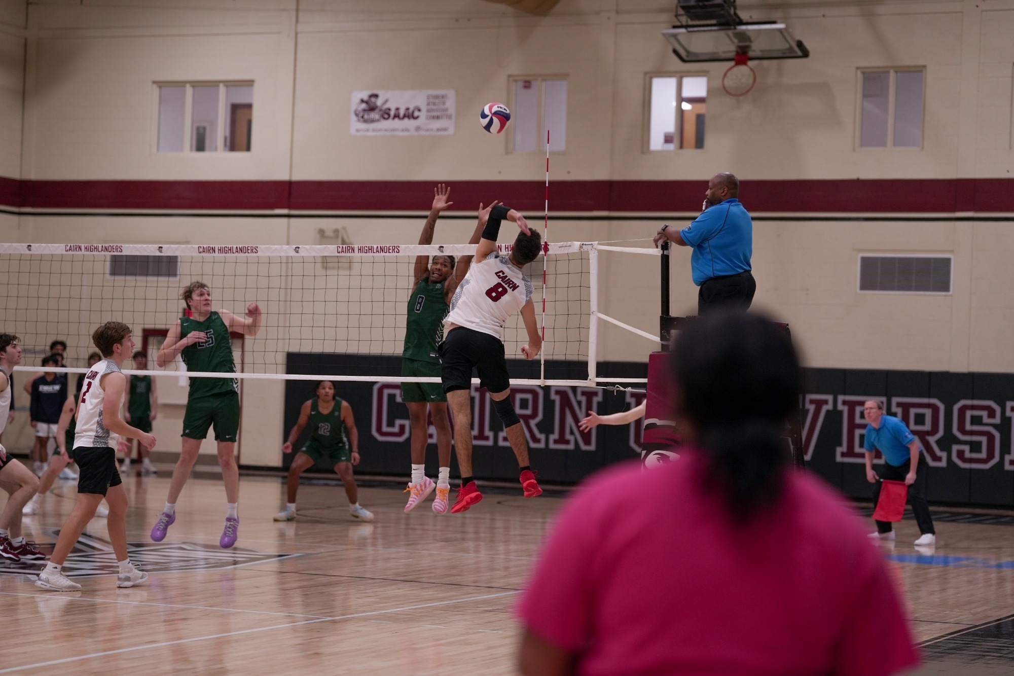 Nehemiah Clark Spikes the ball