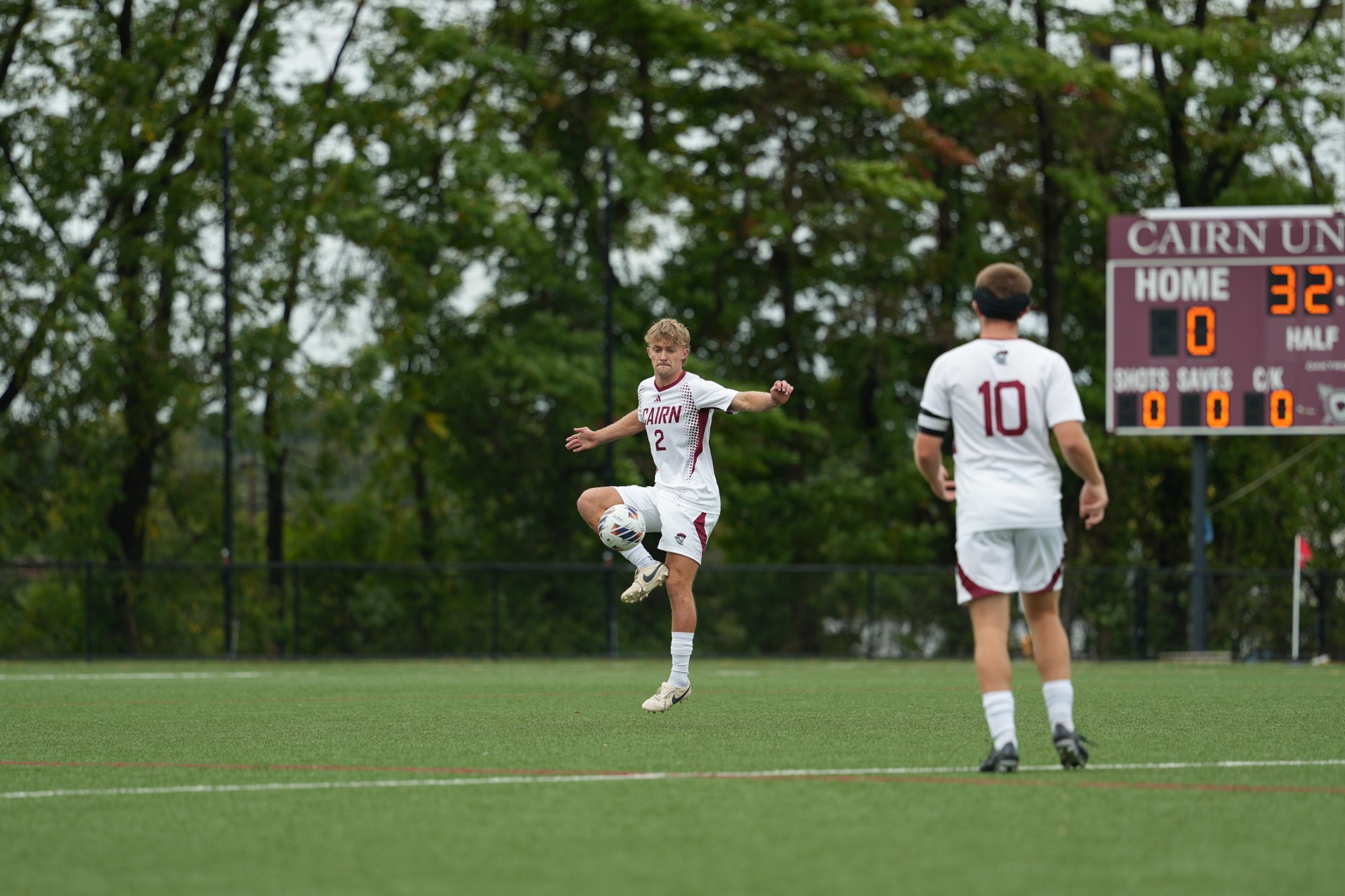 Soccer player receives ball