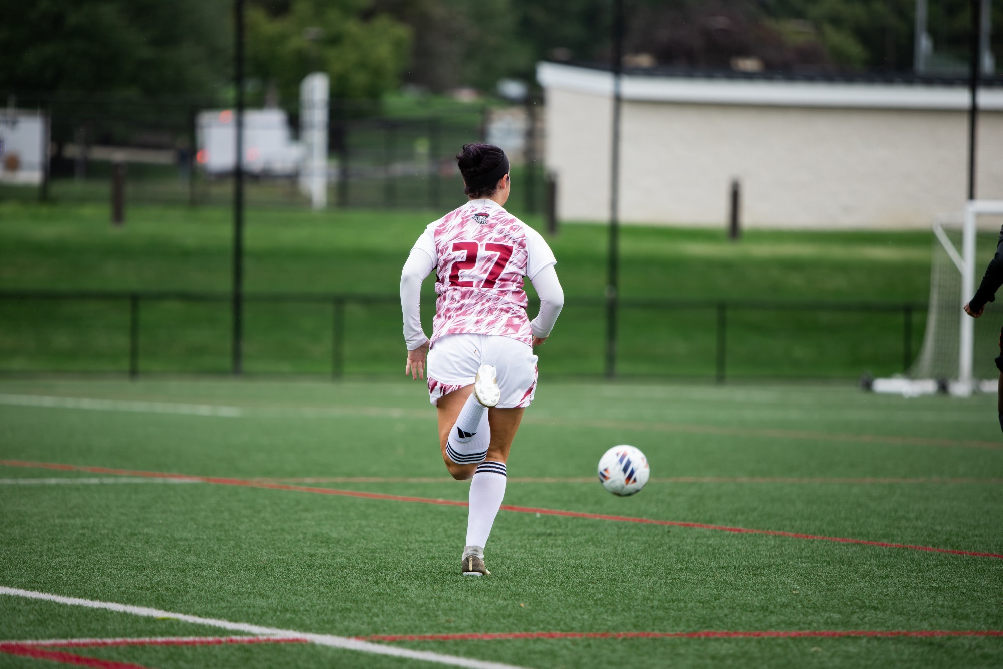 Soccer Player running with ball