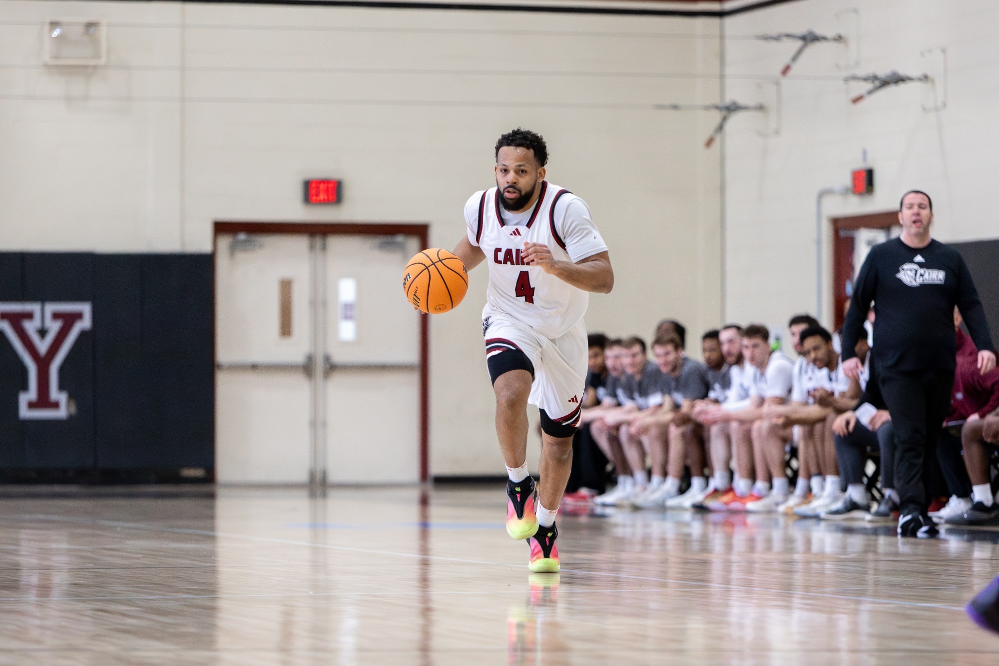 Chris Hill Brings the ball up the court