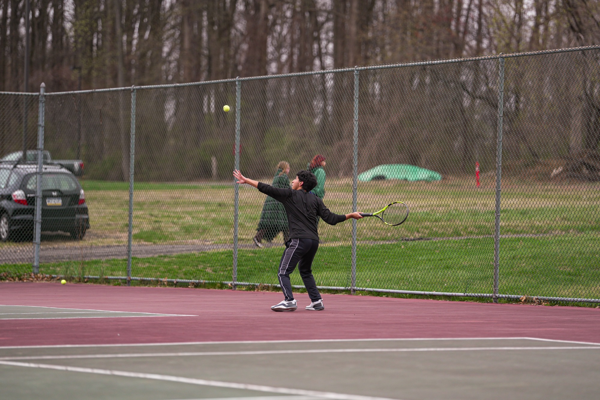 Matteo Baez winds up a forehand 