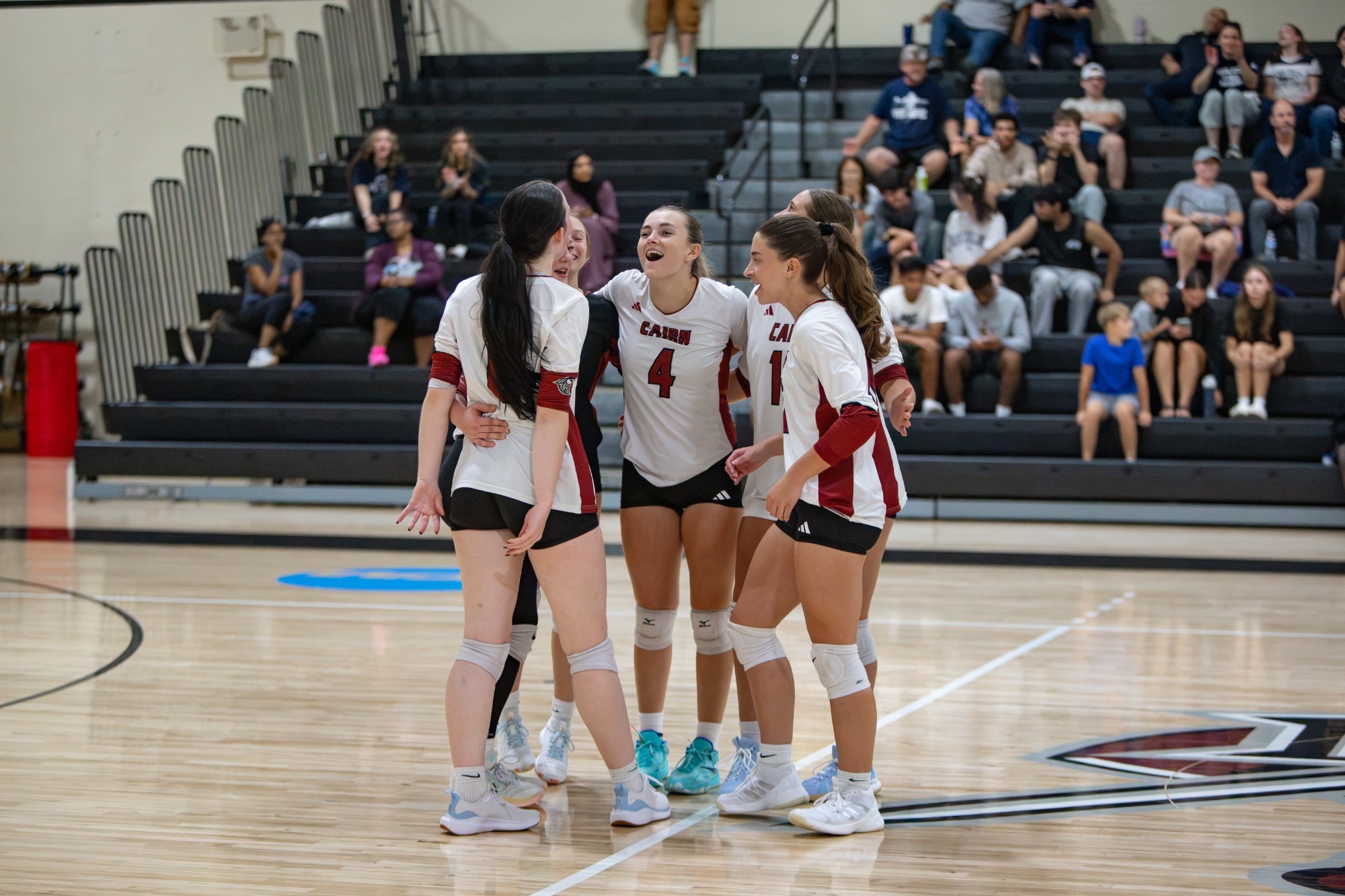 Highlander Volleyball players celebrate point