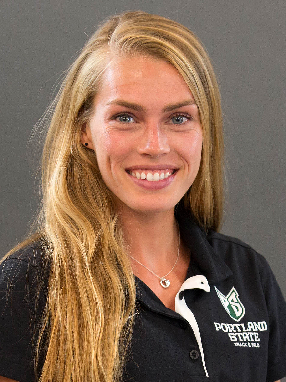 Head shot of Portland State volunteer assistant coach in charge of distances Colleen Quigley.