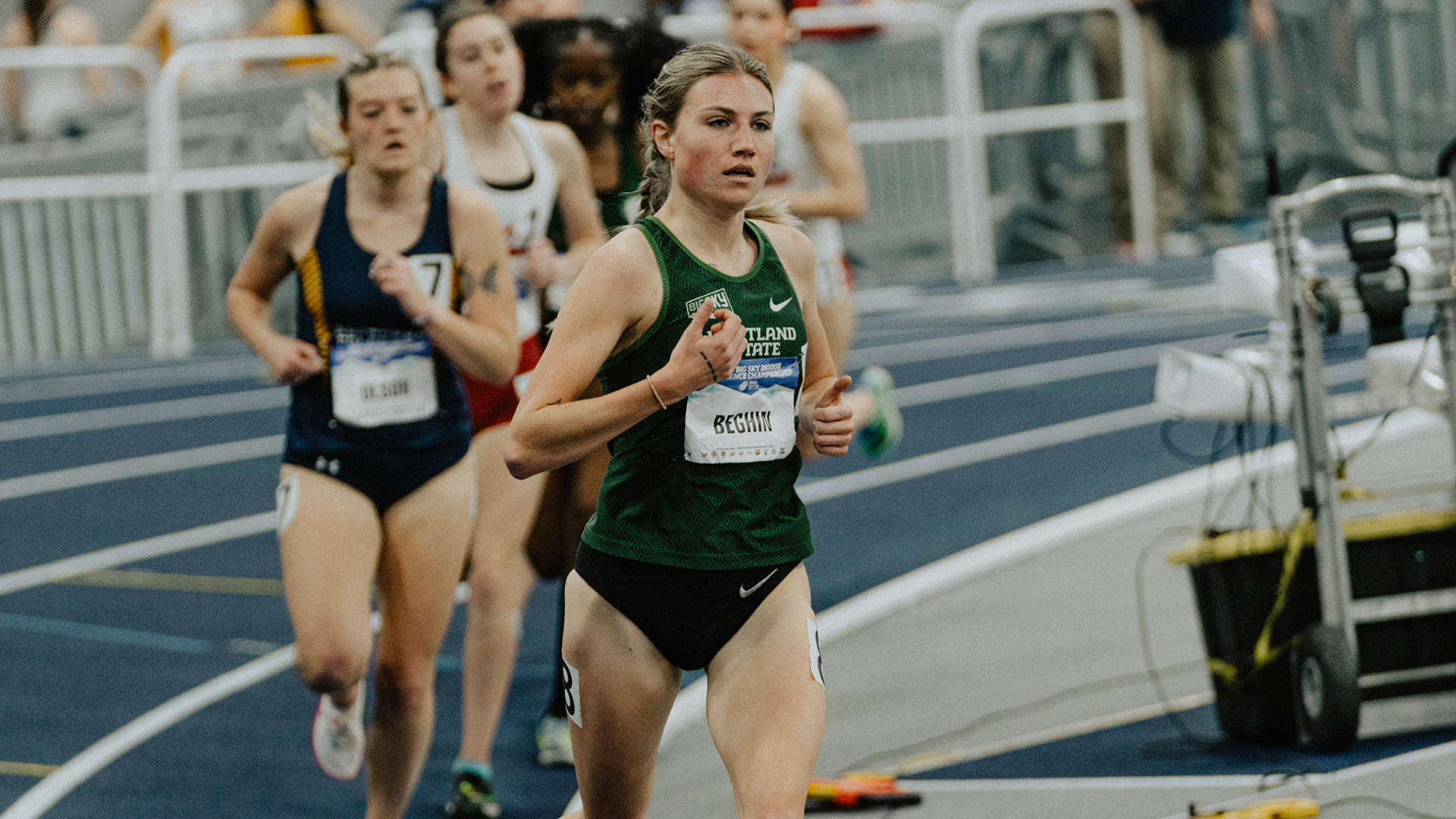 Portland State track & field runner Laura Beghin leads her heat of the mile at the 2024 Big Sky Indoor Championships