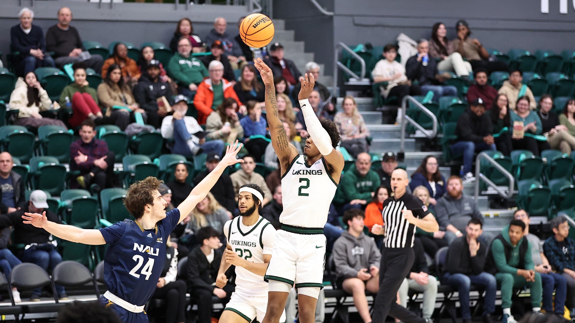Bobby Harvey takes a jump shot against Northern Arizona