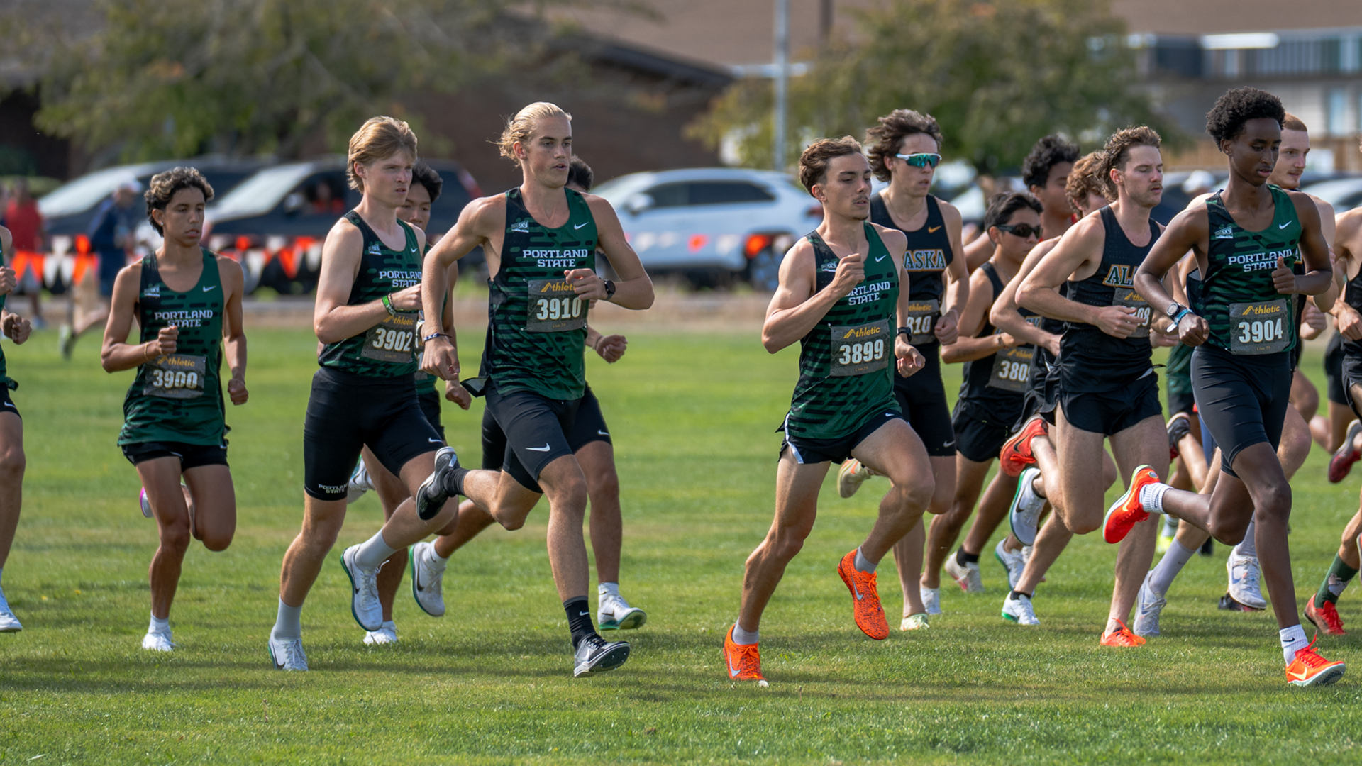 Portland State men's cross country runners sprint off the line at the Mike Johnson Classic.