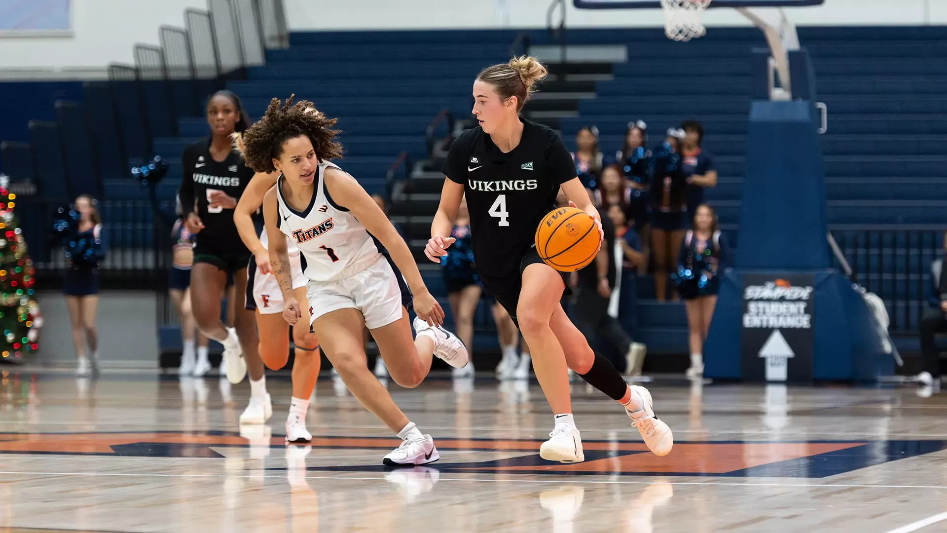 Portland State women's basketball player Sophie Buzzard brings the ball up the floor during the Vikings' game against Cal State Fullerton.