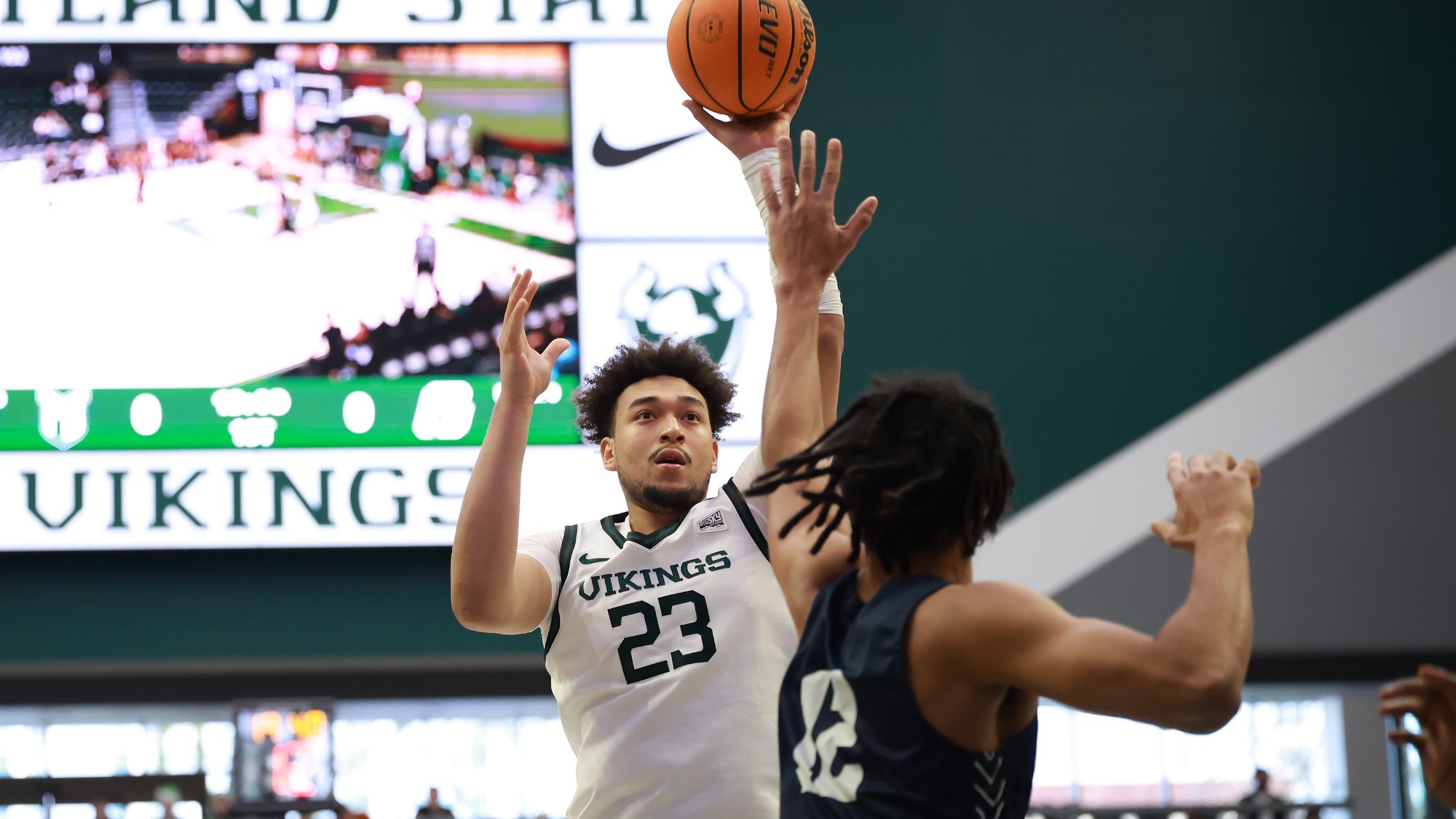 Terri Miller Jr. scores inside against George Fox 