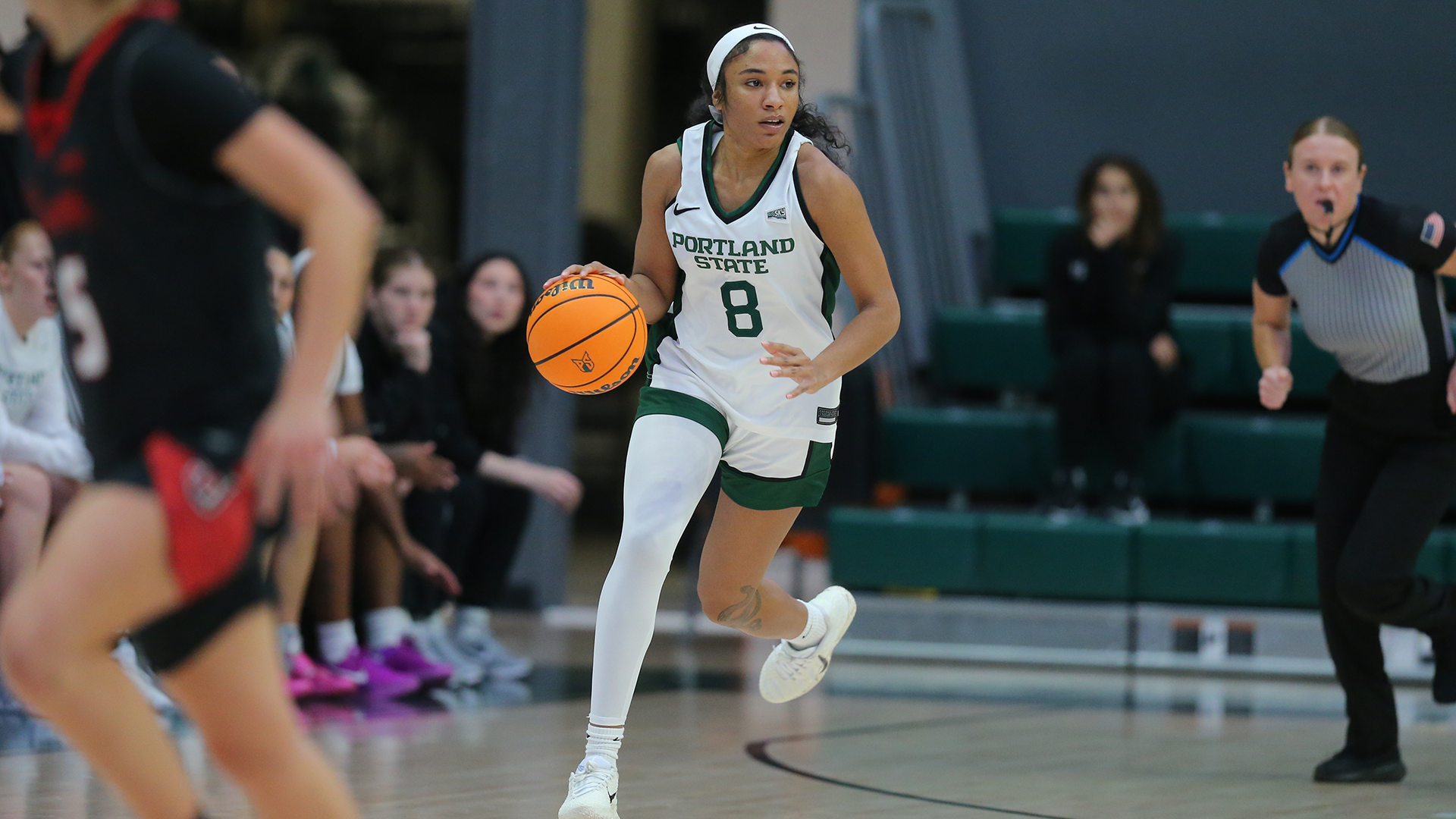 Portland State women's basketball player Cici Ellington brings the ball up the floor during the Vikings' game against Seattle U.