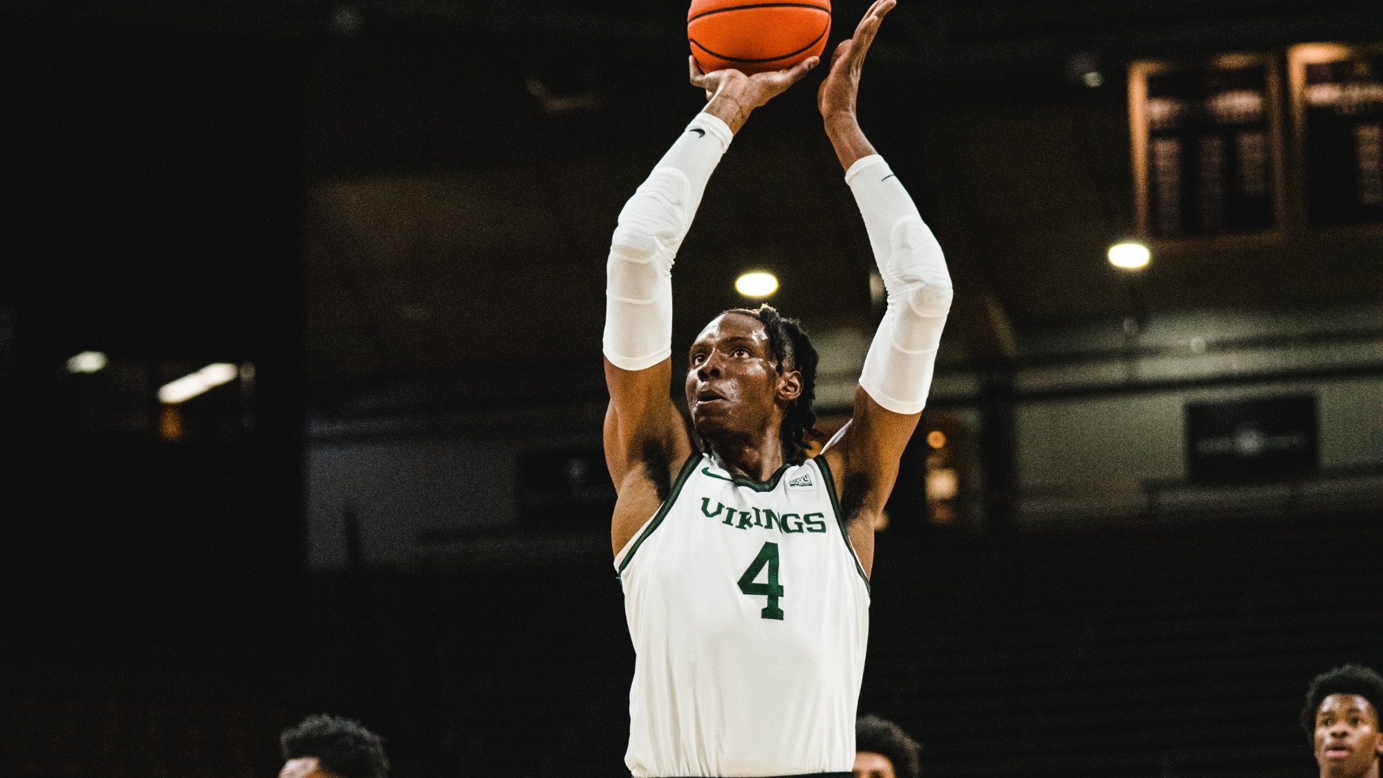 Tre-Vaughn Minott shoots a free throw in a game at Colorado