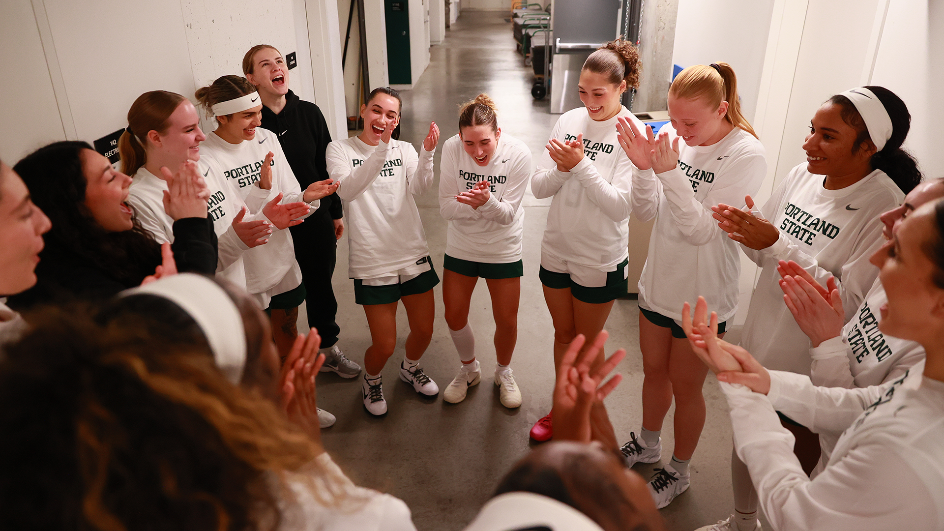 The Portland State women's basketball team huddles together before the start of their game against Seattle U.