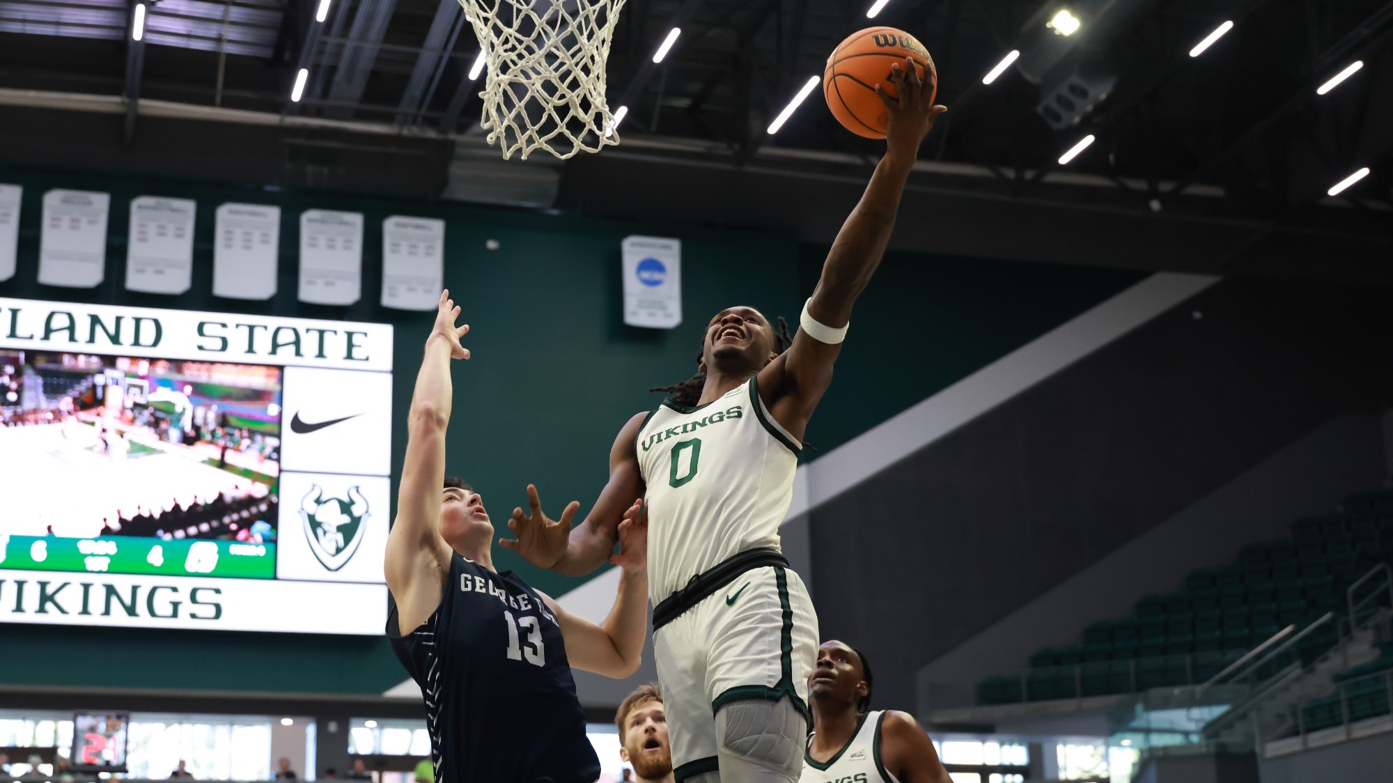 Keyon Kensie Jr. goes for a layin in a game against George Fox.