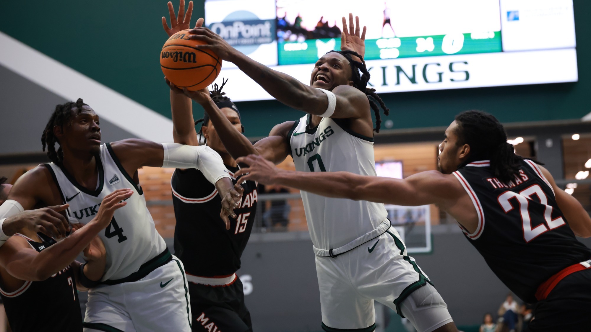 Keyon Kensie Jr. battles inside for a basket against Omaha.