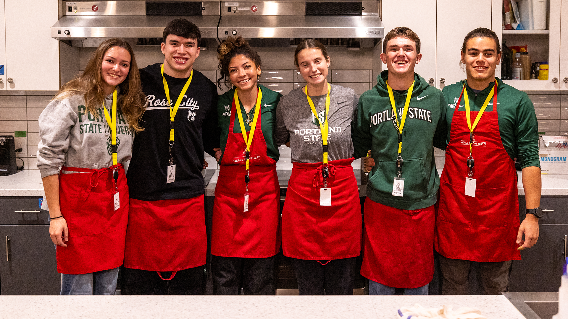 A group shot of six Portland State track & field athletes who volunteered with the Ronald McDonald House during Thanksgiving Weekend in 2024.