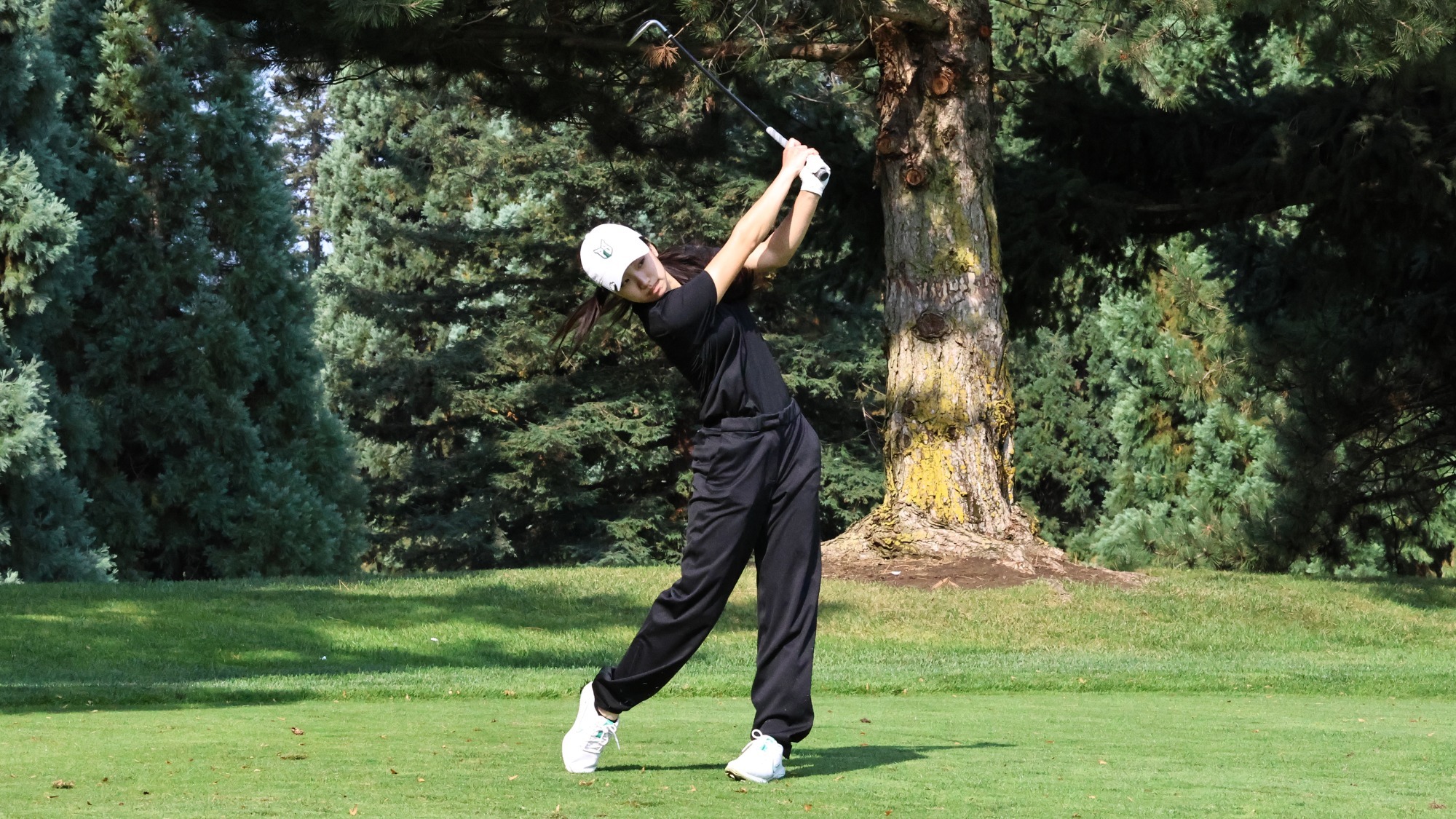 Junior Momo Udom hits a wedge shot