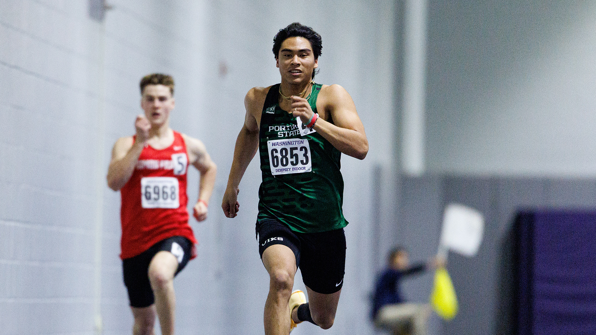 Portland State track & field runner Isaiah Cadengo sprints to the finish line in the 200 meters at the UW Preview.