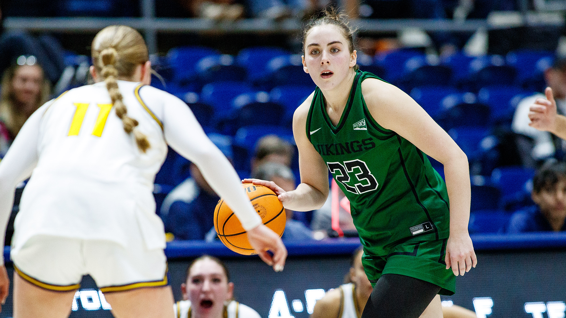Portland State women's basketball player Taylor Moffat brings the ball up the floor in the Vikings' road game at Northern Arizona.