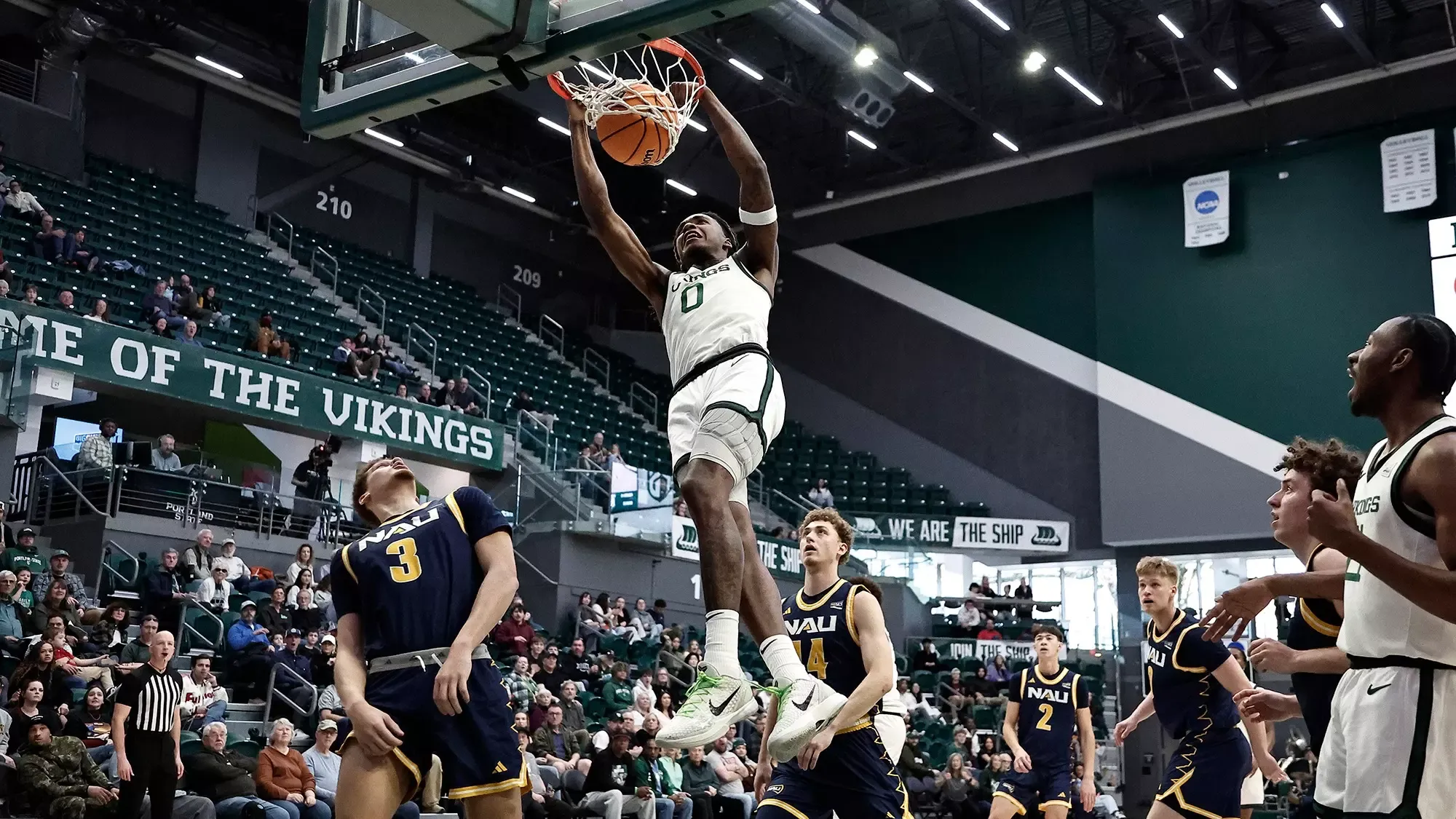 Keyon Kensie dunks on a breakaway against Northern Arizona