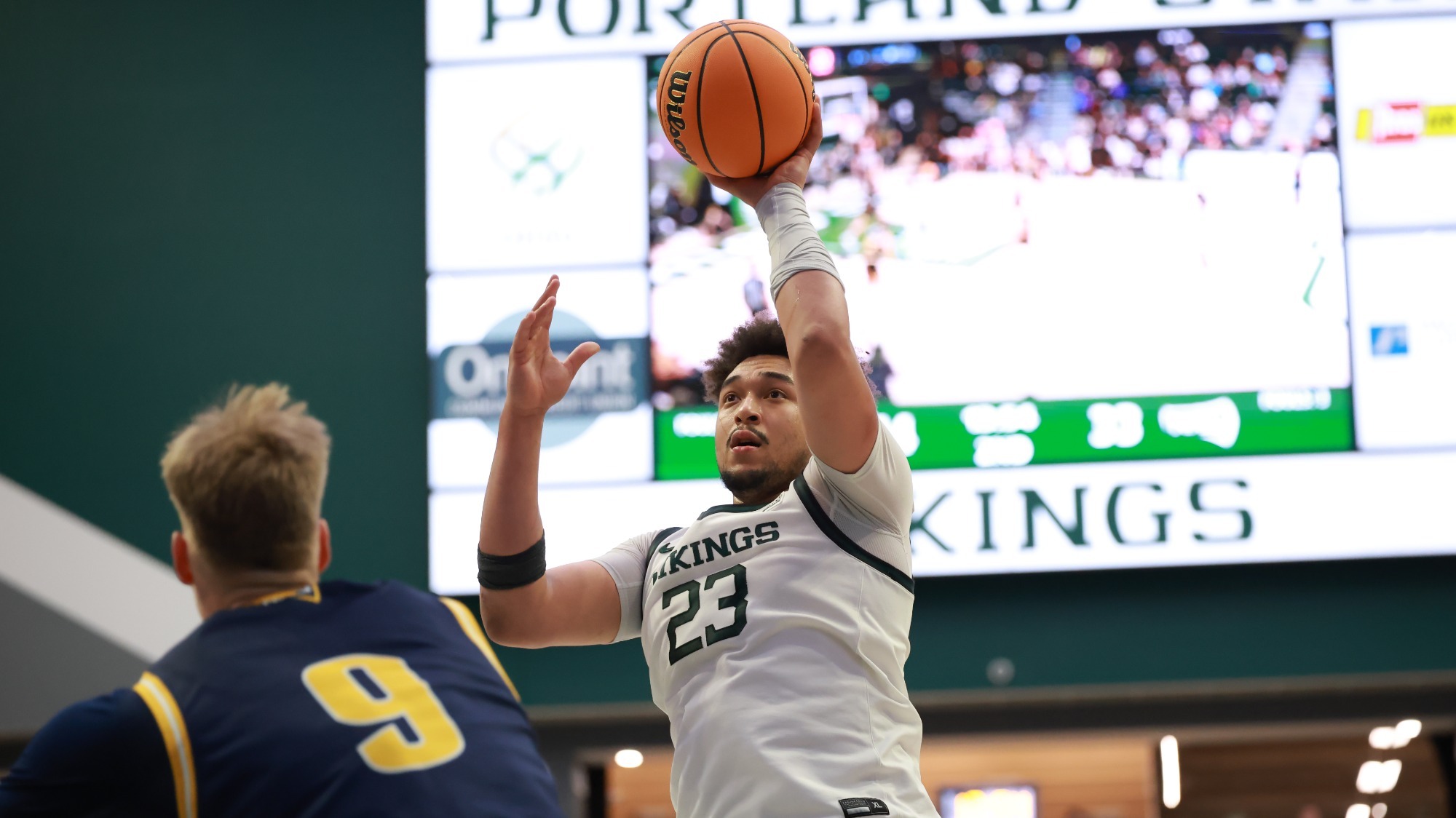 Terri Miller Jr. shoots a short jump shot in a win over Northern Arizona at Viking Pavilion