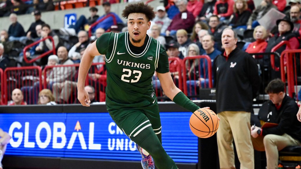 Terri Miller Jr. drives to the hoop against Eastern Washington