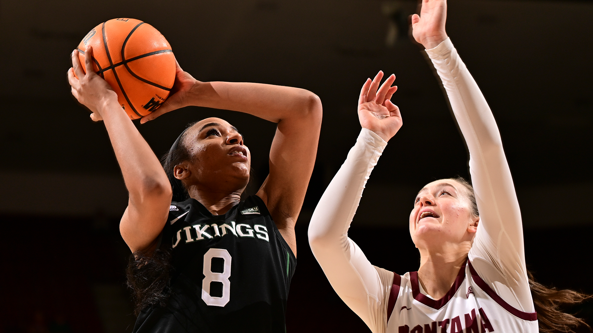Portland State women's basketball player Cici Ellington goes up for a contested layup during the Vikings' road game at Montana.