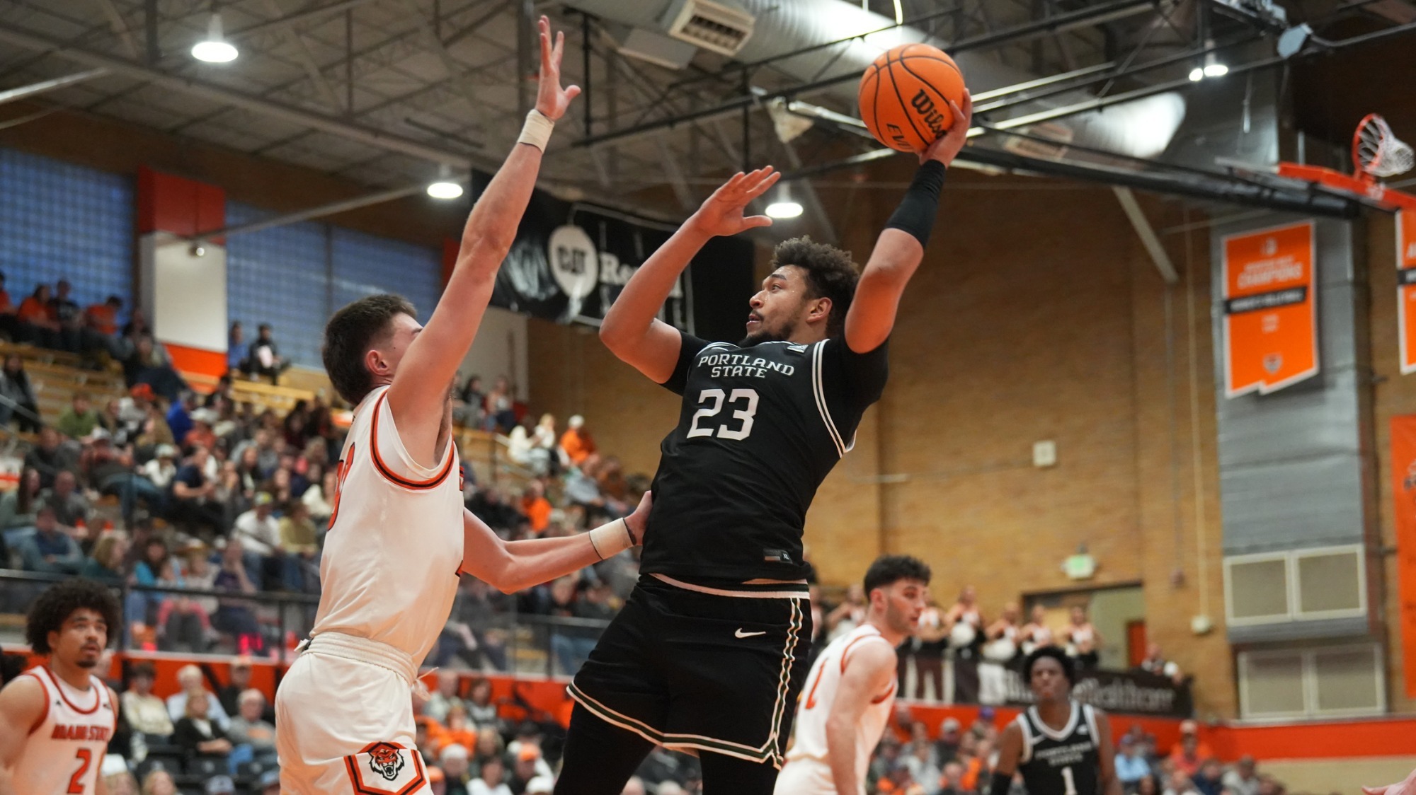 Terri Miller Jr. scores inside against Idaho State on his way to 25 points