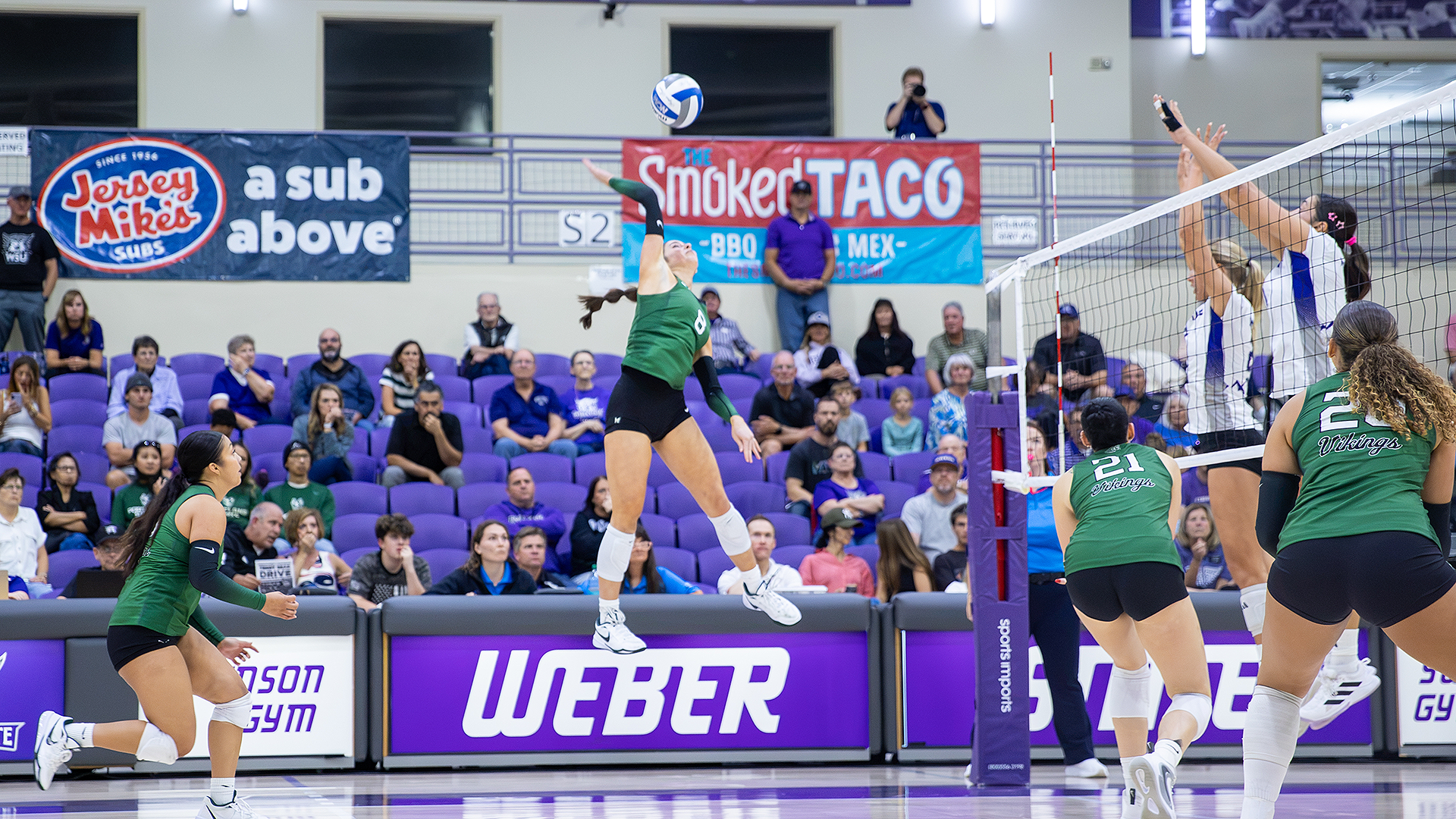Portland State volleyball player Maryn Hall jumps for an attack in the Vikings' road match against Weber State.