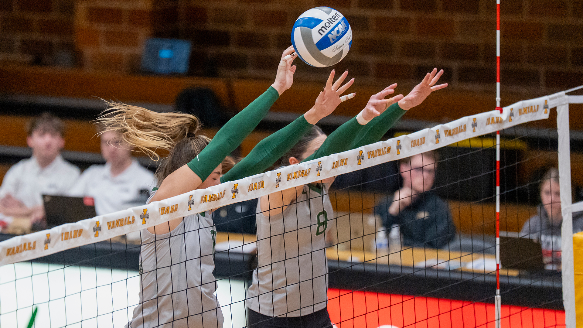 Portland State volleyball players Maryn Hall and Jordyn Romano go up for a block during their match at Idaho.