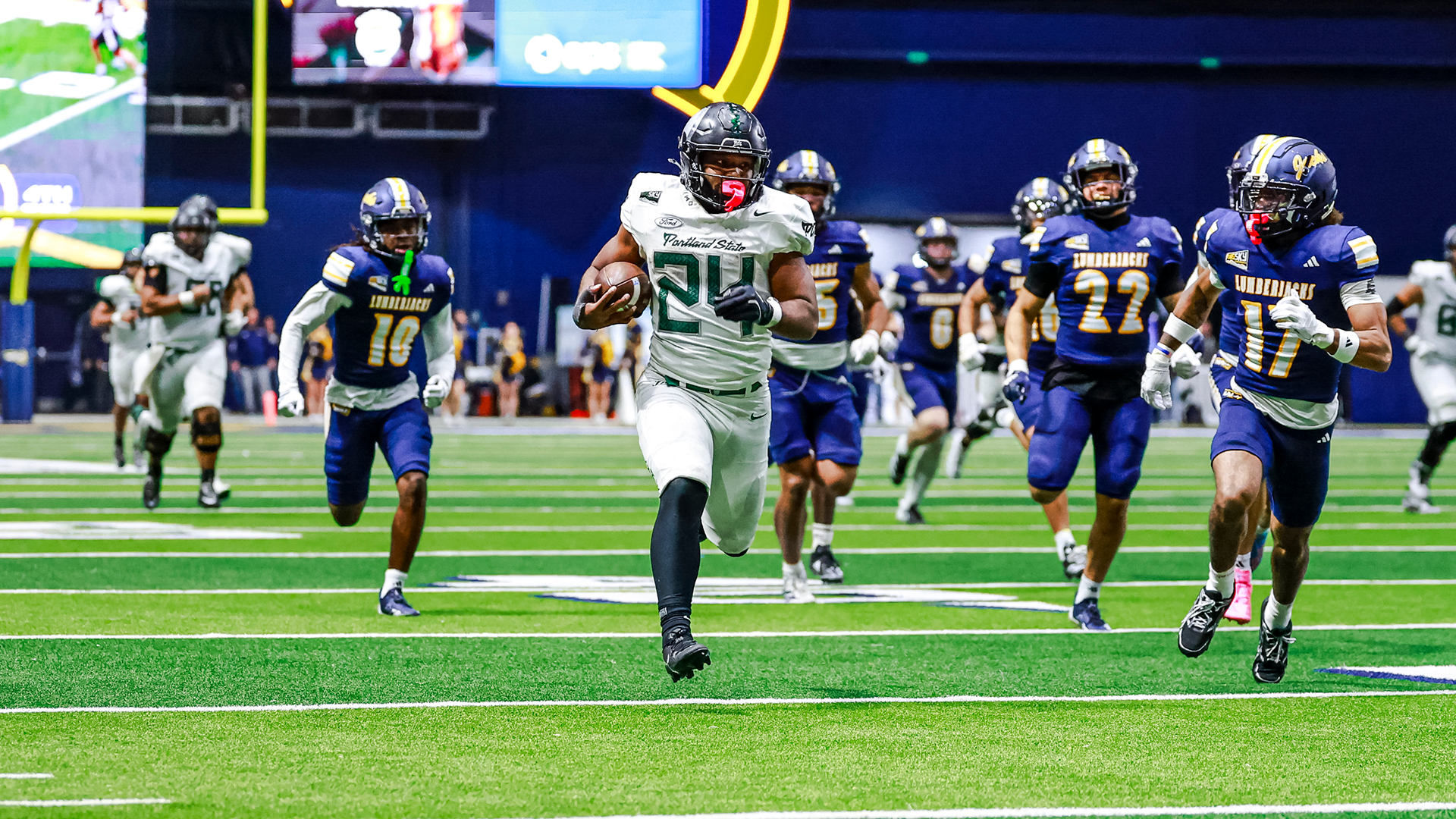 Portland State football player Delon Thompson breaks free for a 63-yard rush against Northern Arizona.