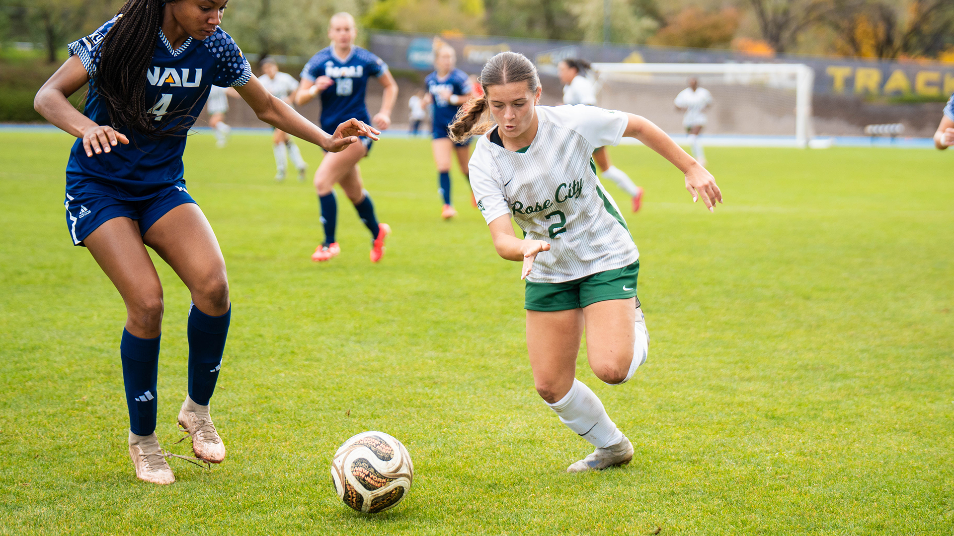 Portland State women's soccer player Kendel Johnson battles for a ball against a Northern Arizona defender.